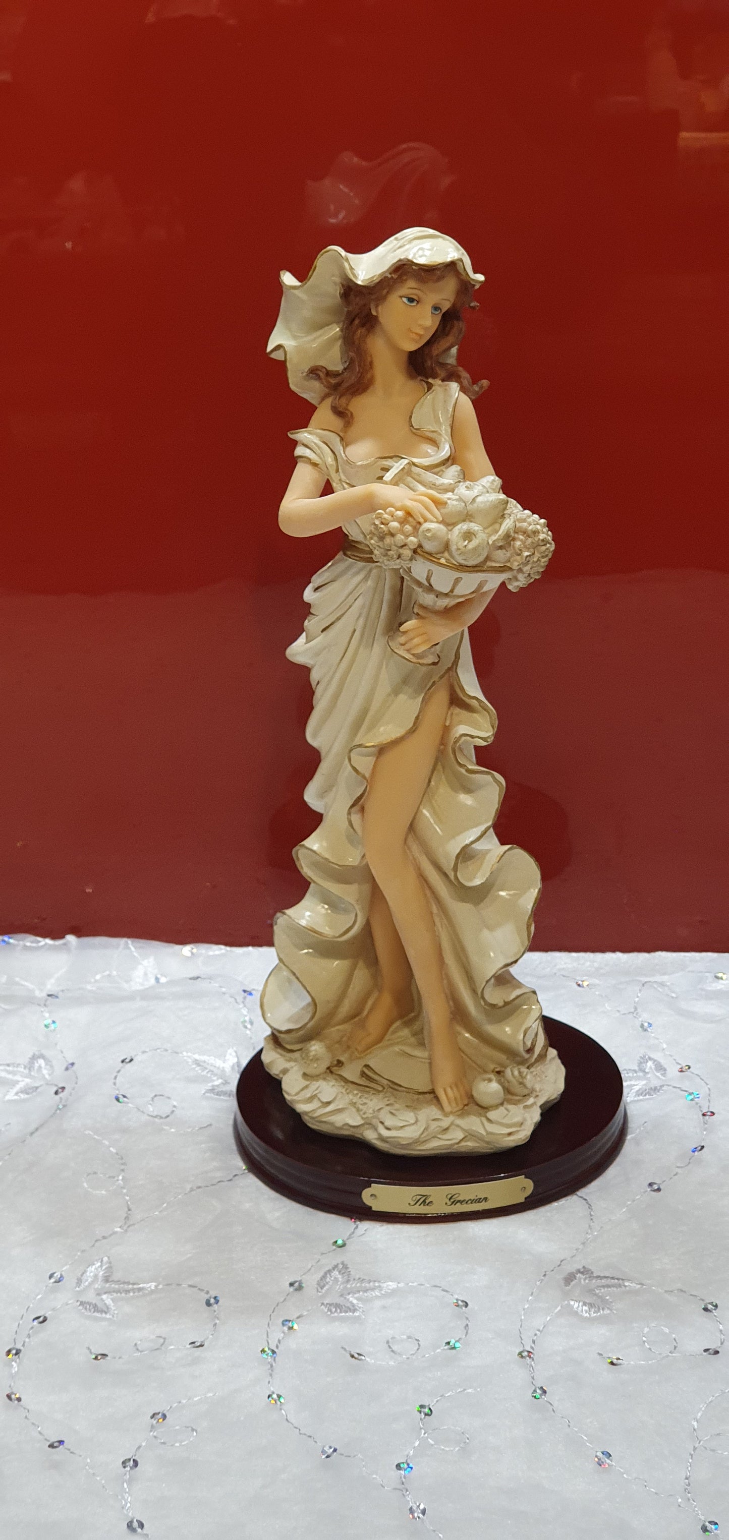 A Regency Fine Arts figure named The Grecian.