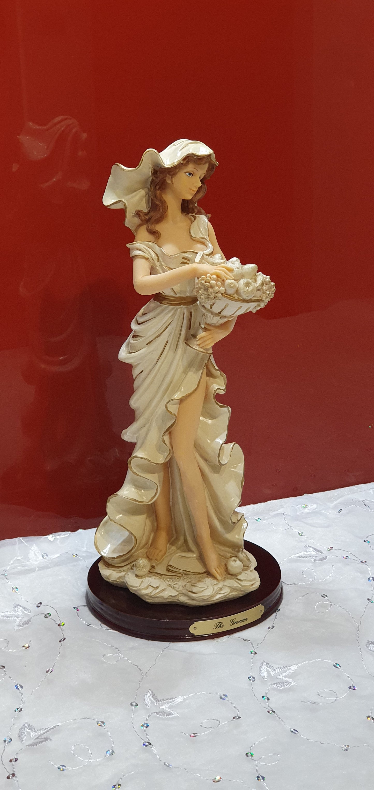 A Regency Fine Arts figure named The Grecian.