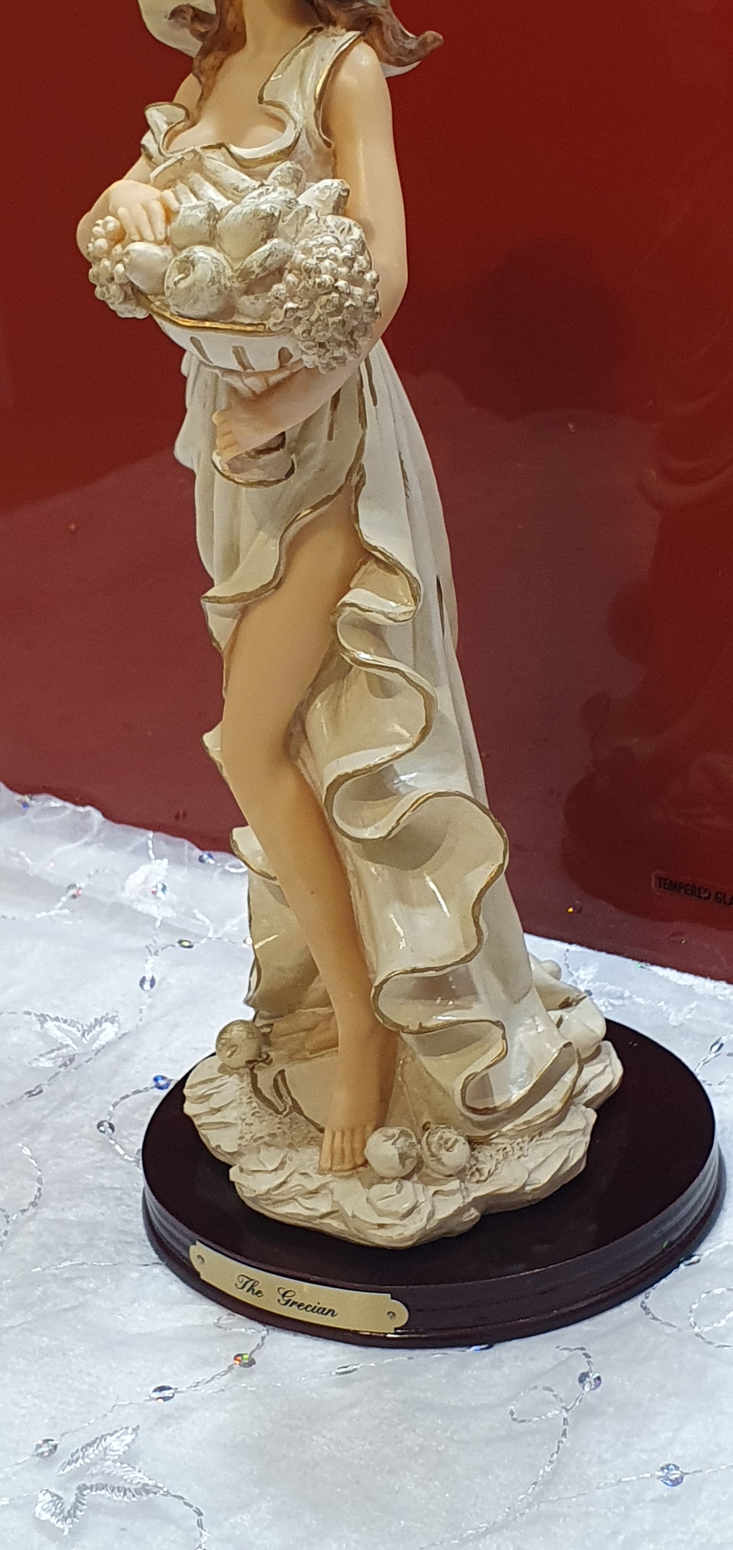 A Regency Fine Arts figure named The Grecian.