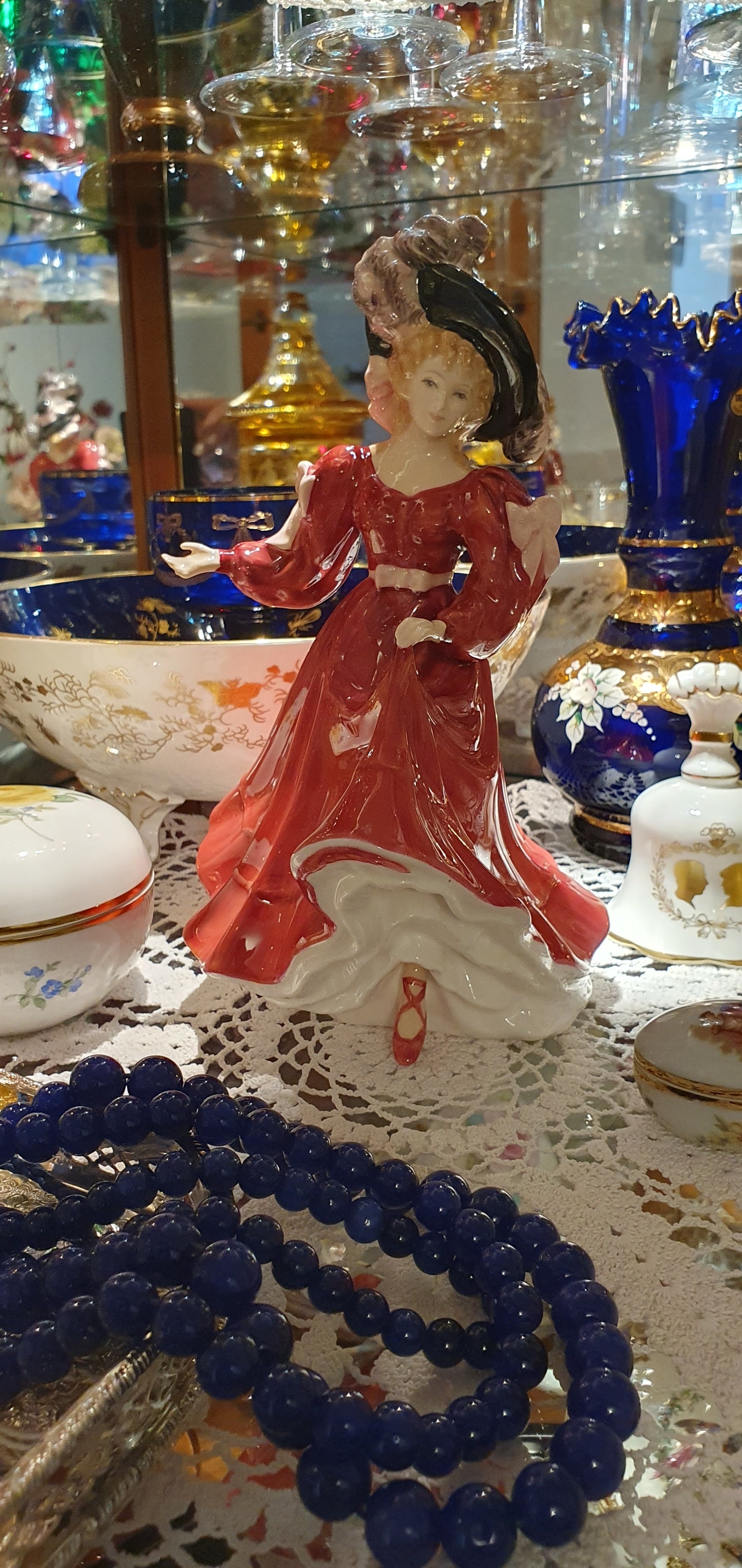 A Royal Doulton figure named Patricia.