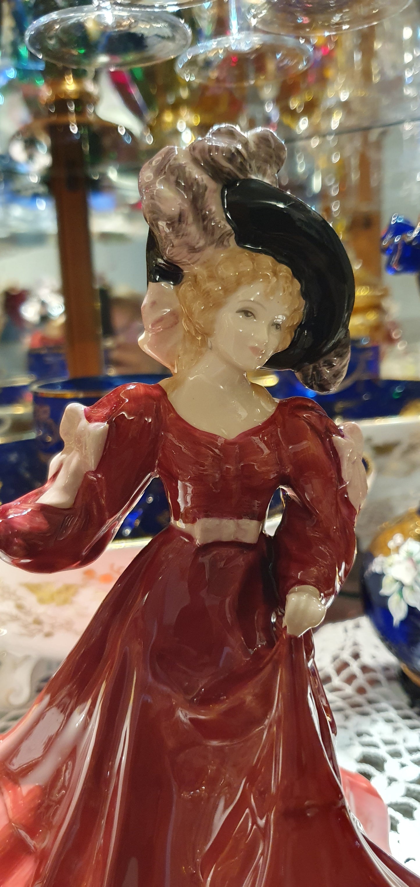 A Royal Doulton figure named Patricia.