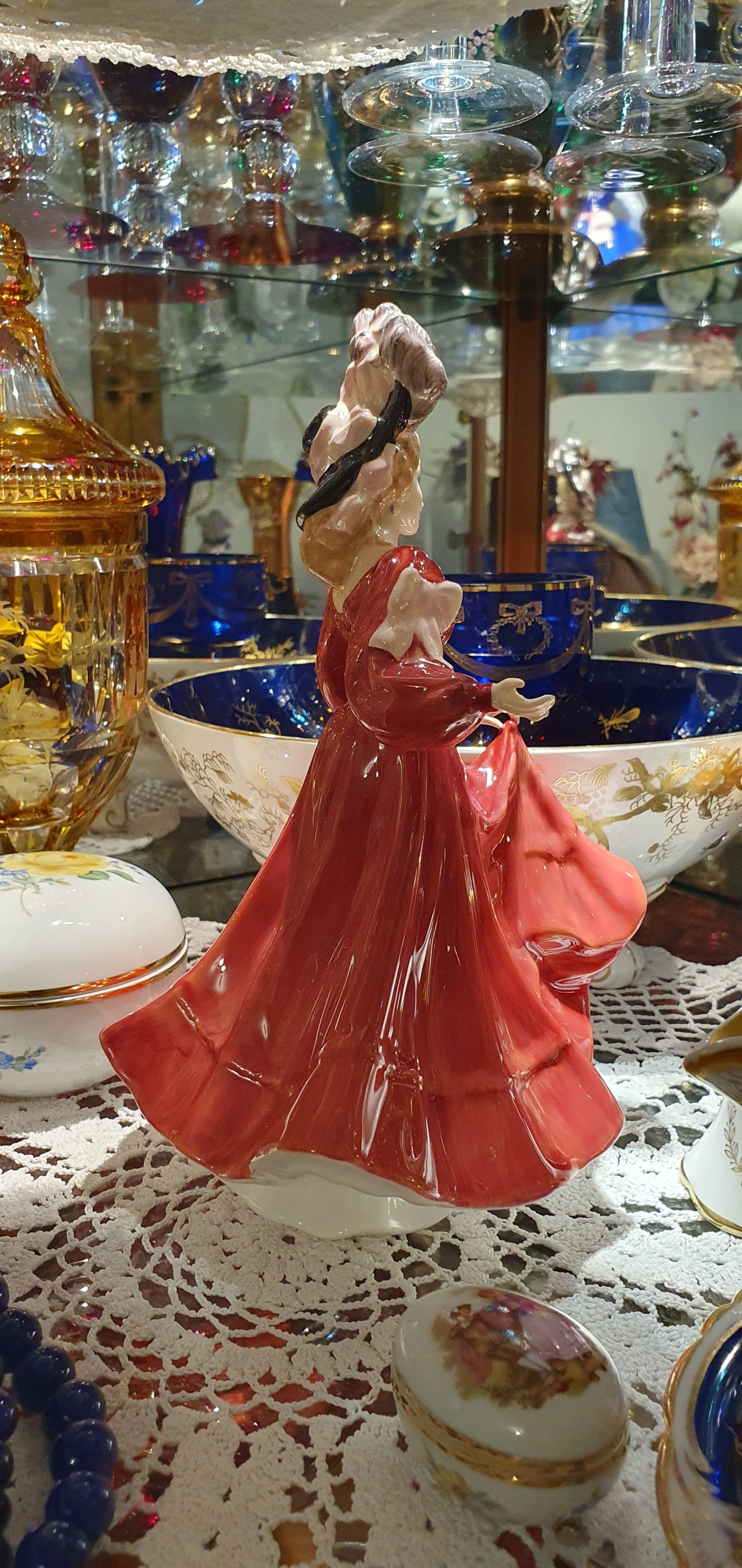 A Royal Doulton figure named Patricia.