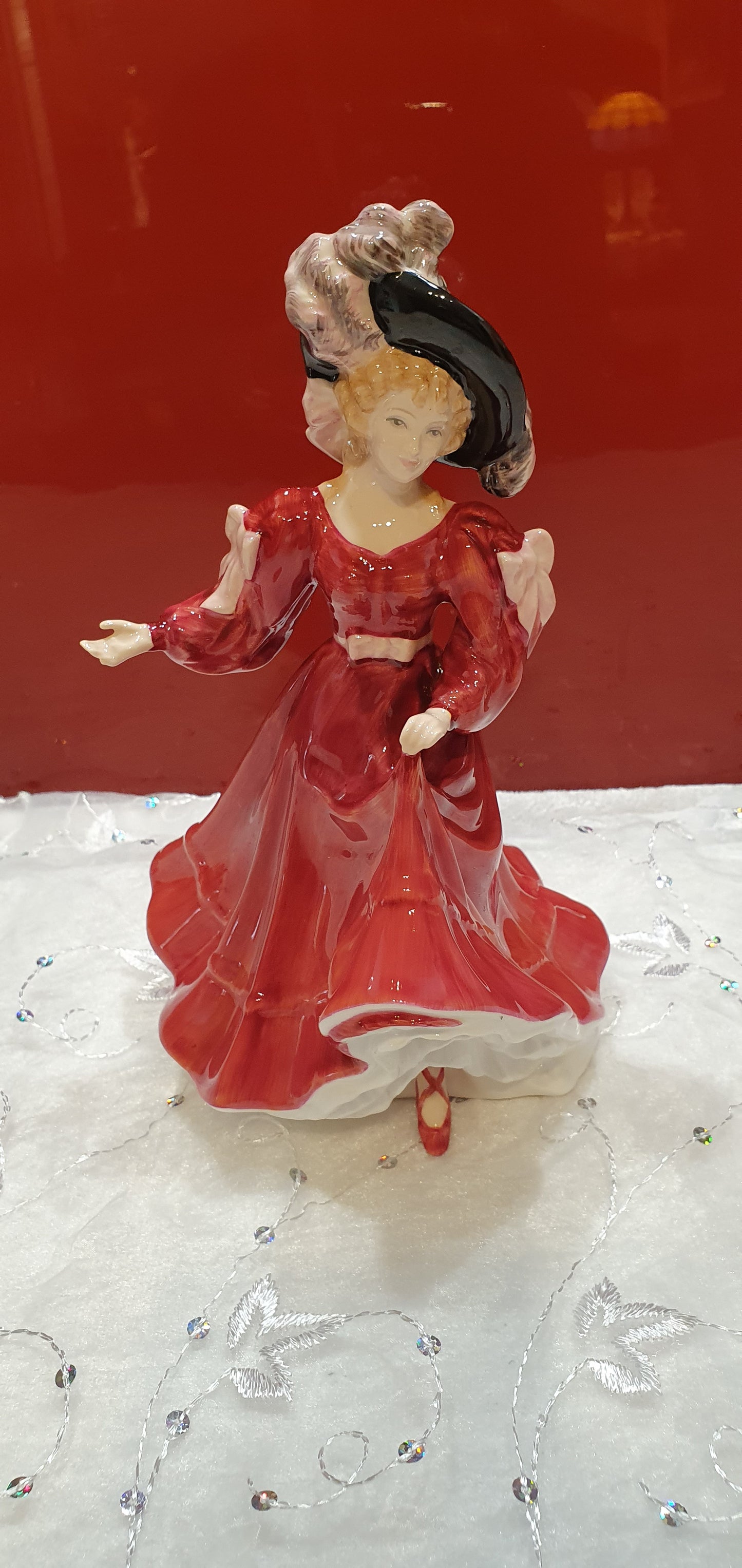 A Royal Doulton figure named Patricia.