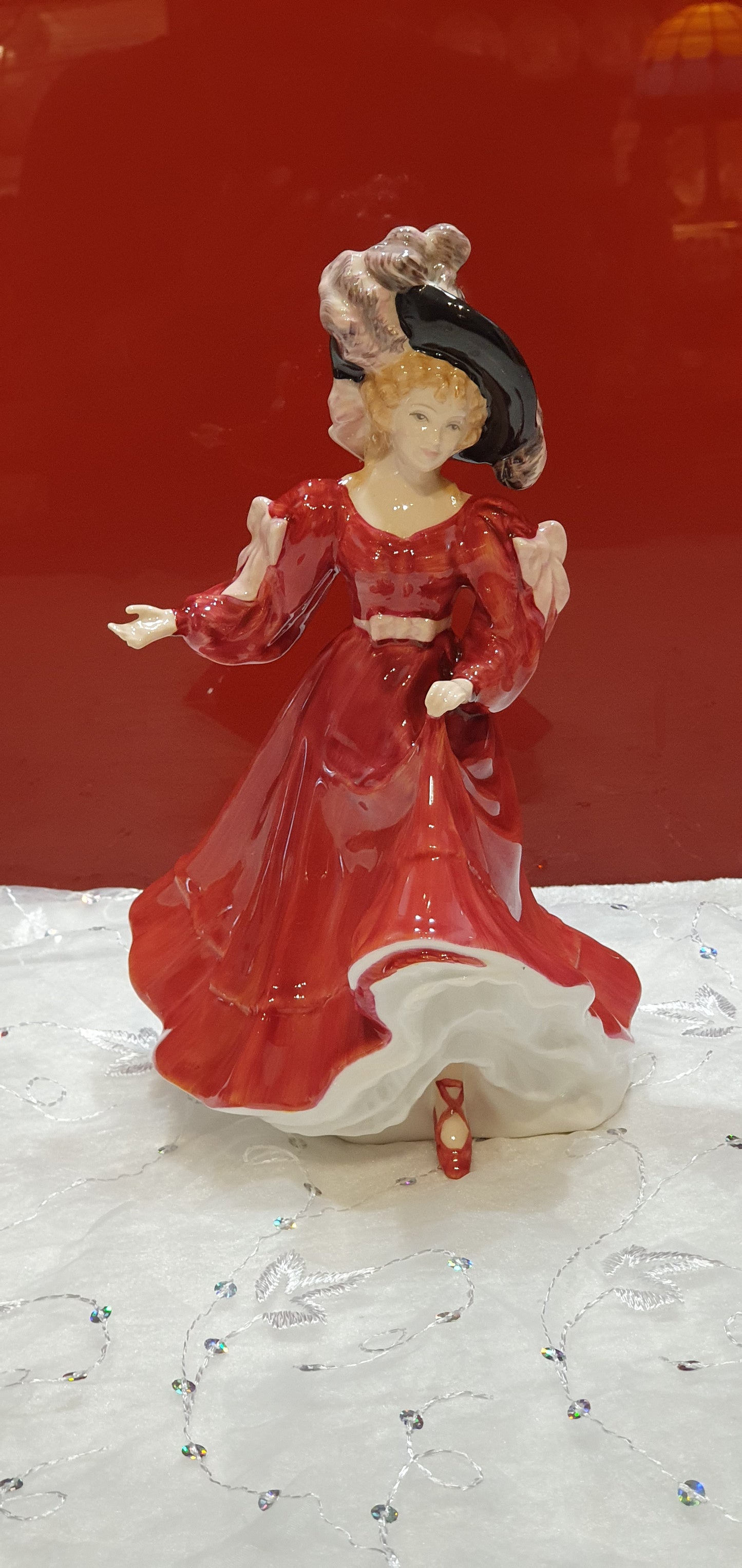 A Royal Doulton figure named Patricia.