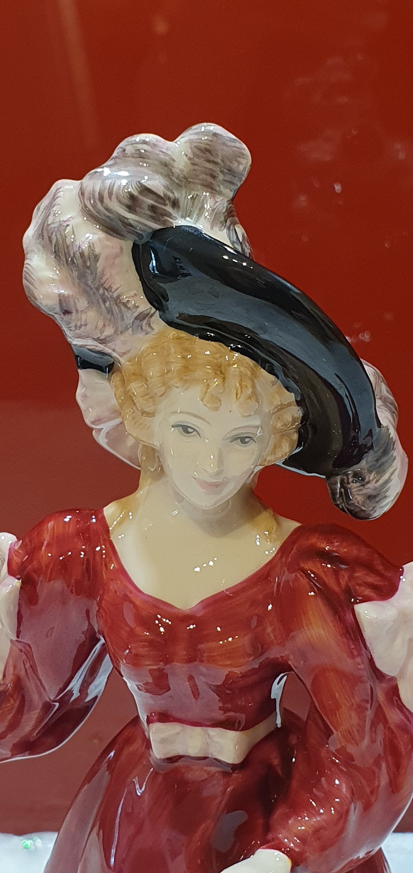 A Royal Doulton figure named Patricia.