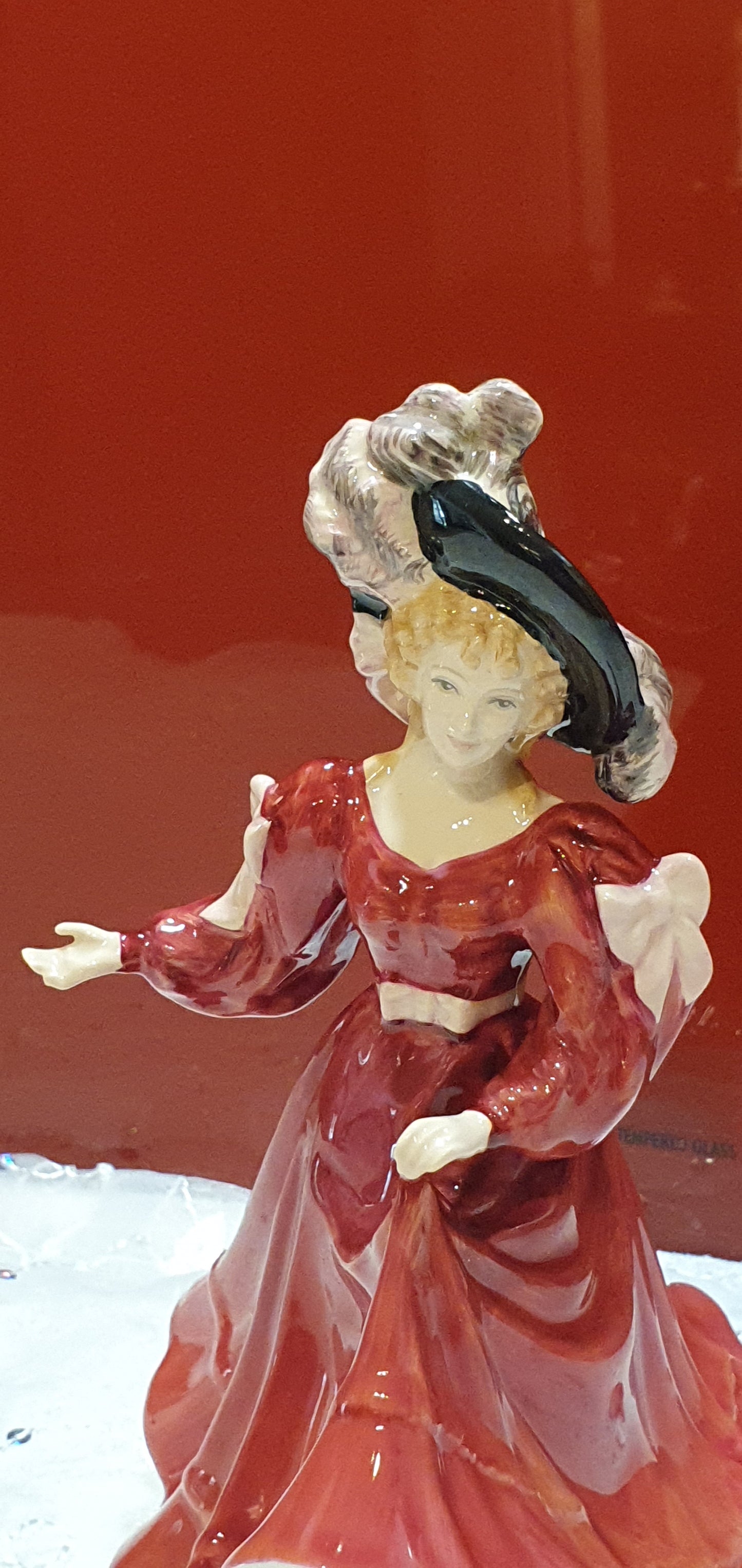 A Royal Doulton figure named Patricia.