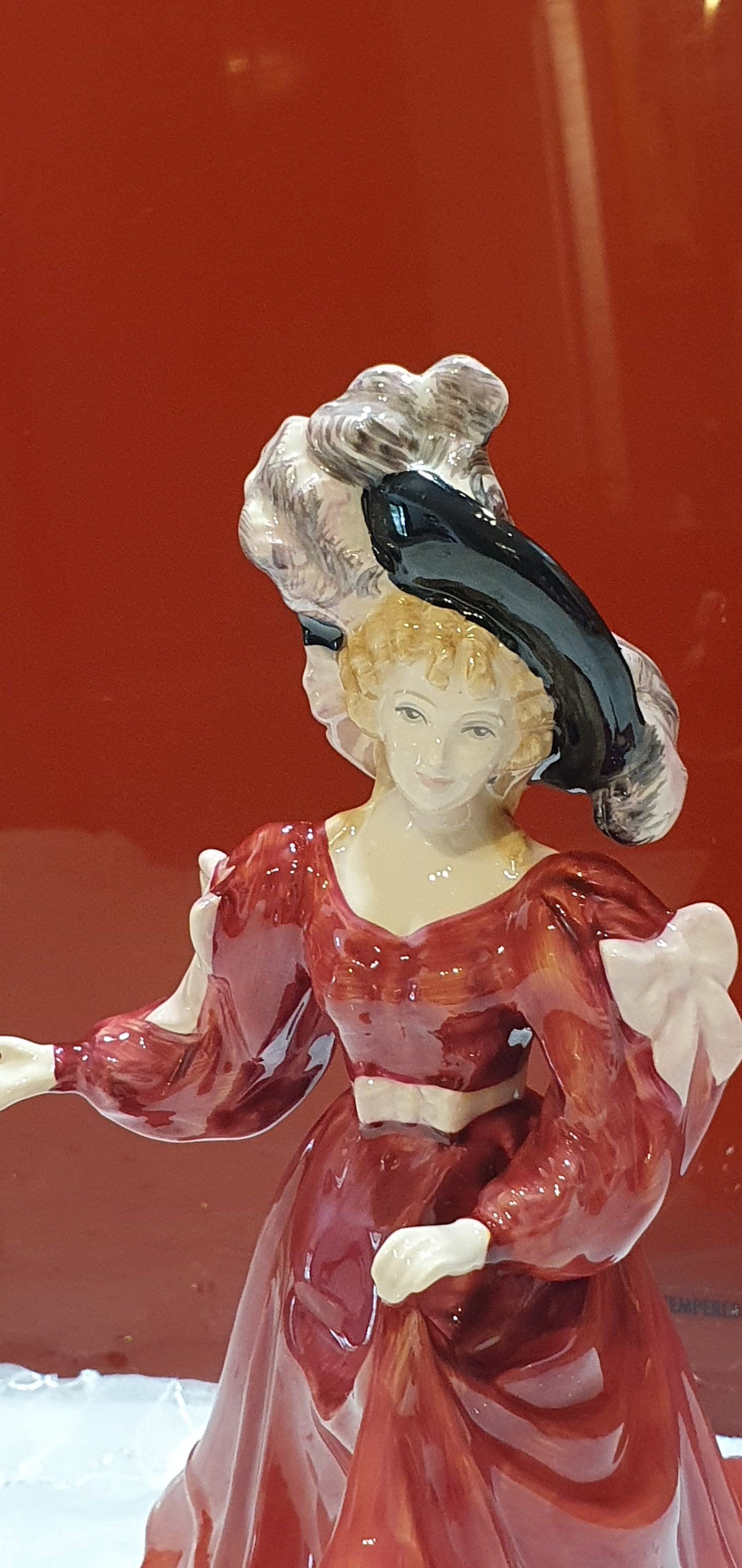 A Royal Doulton figure named Patricia.