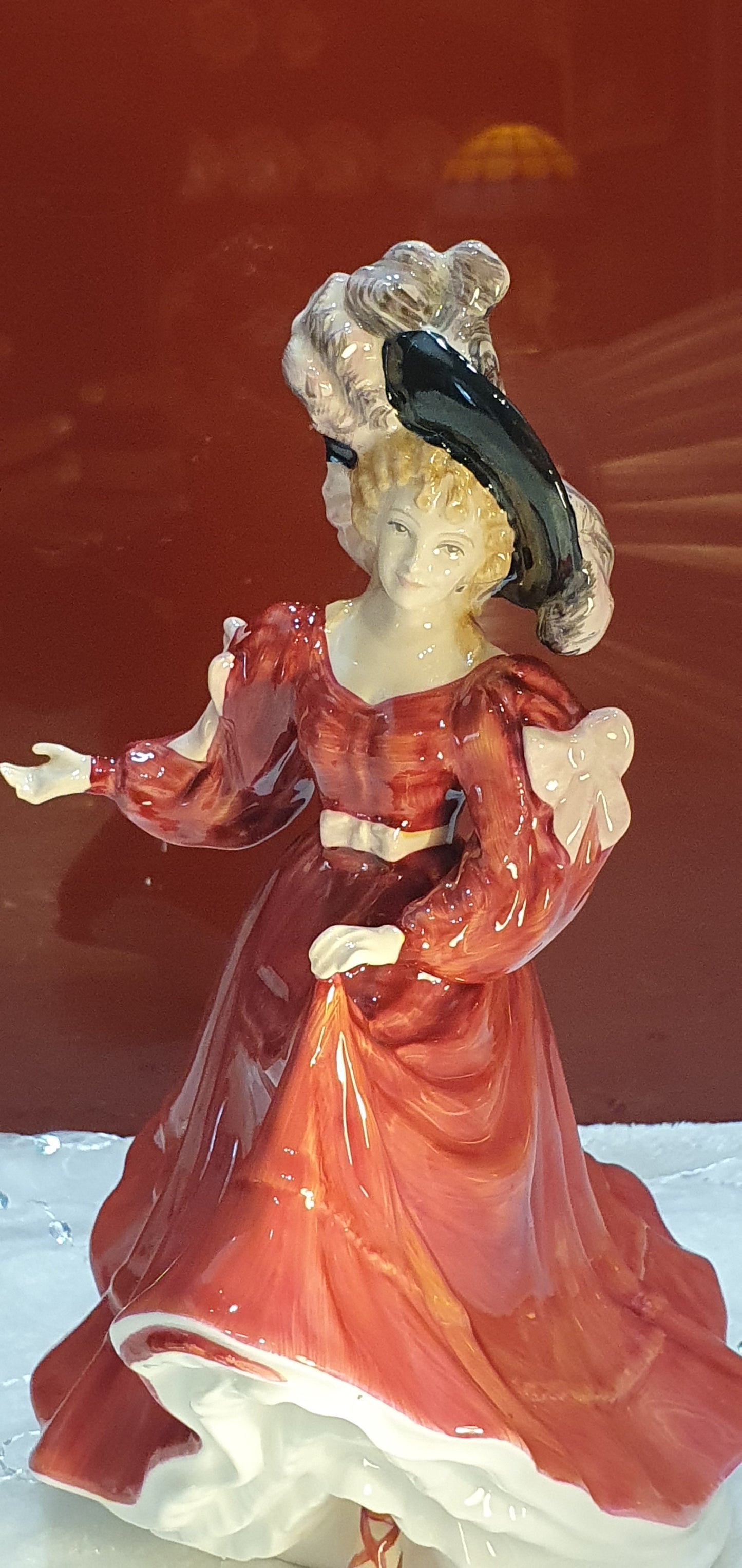 A Royal Doulton figure named Patricia.