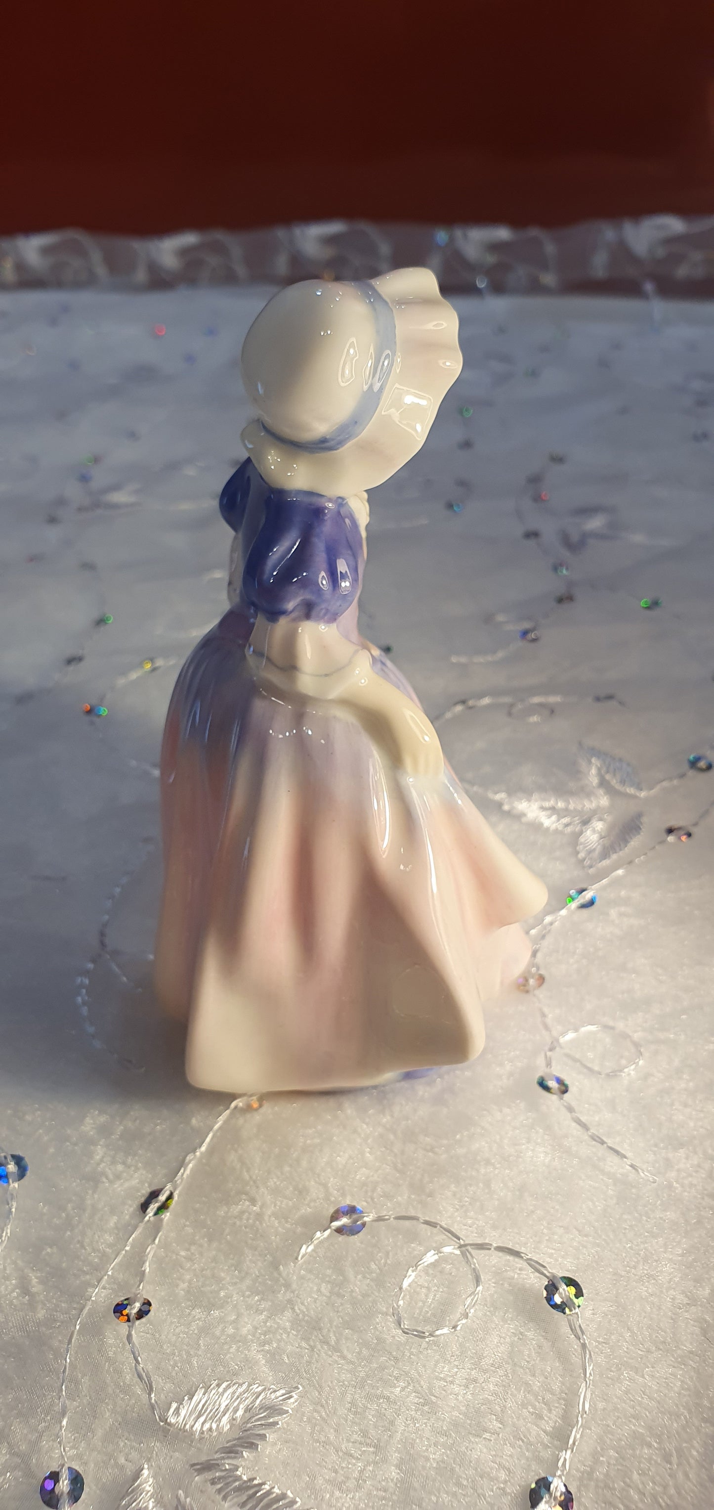 A Royal Doulton girl figure is named 'Dinky Do' HN 1678