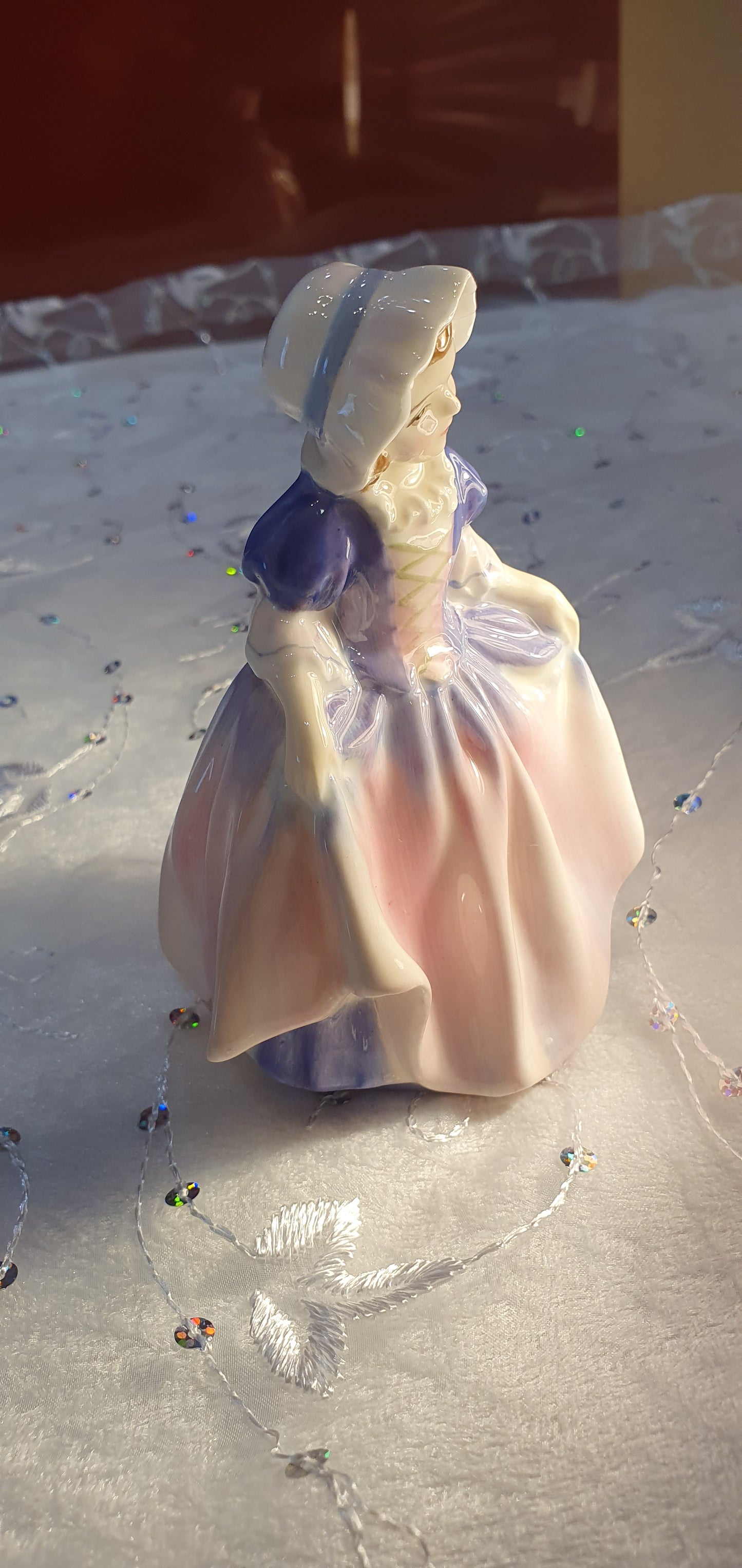 A Royal Doulton girl figure is named 'Dinky Do' HN 1678