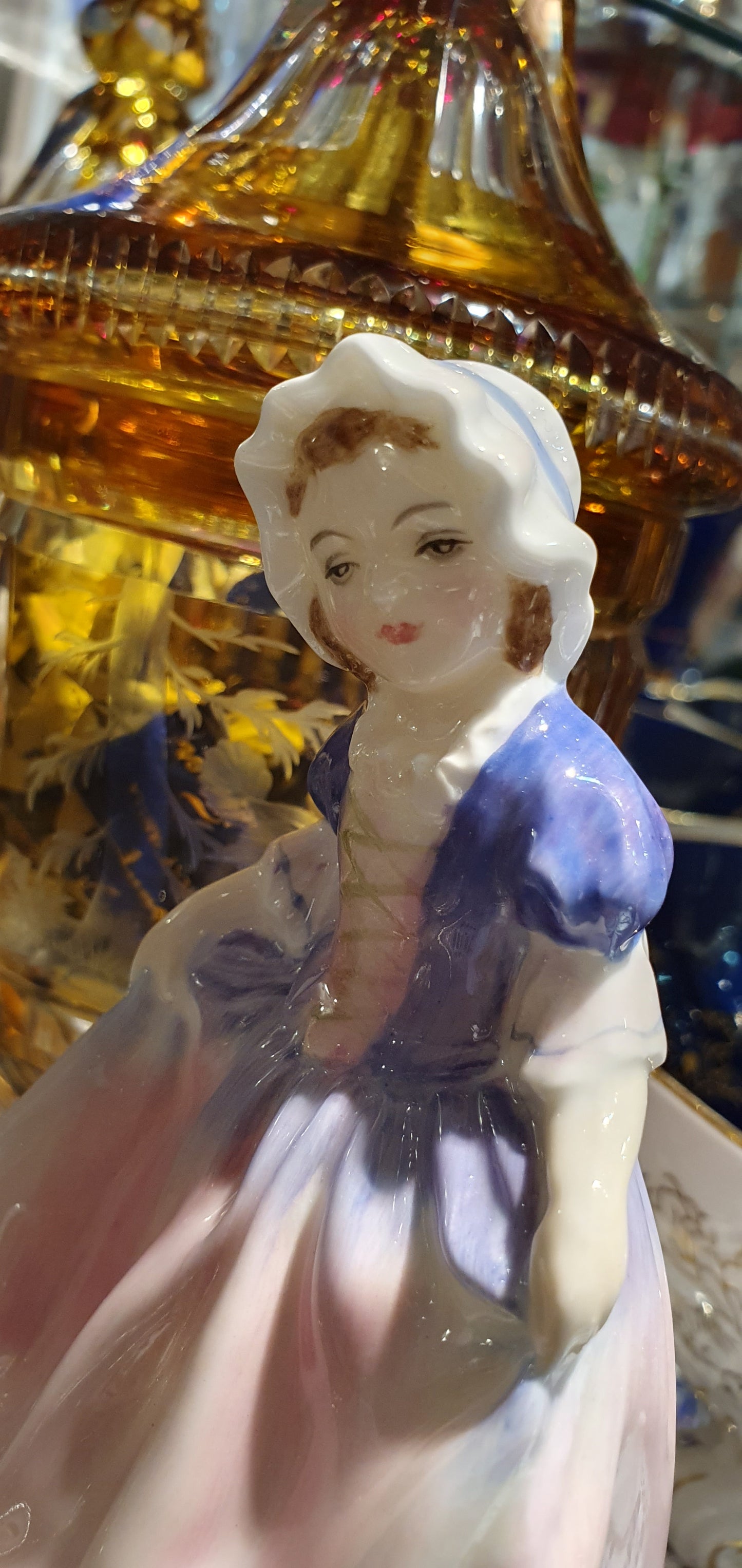 A Royal Doulton girl figure is named 'Dinky Do' HN 1678