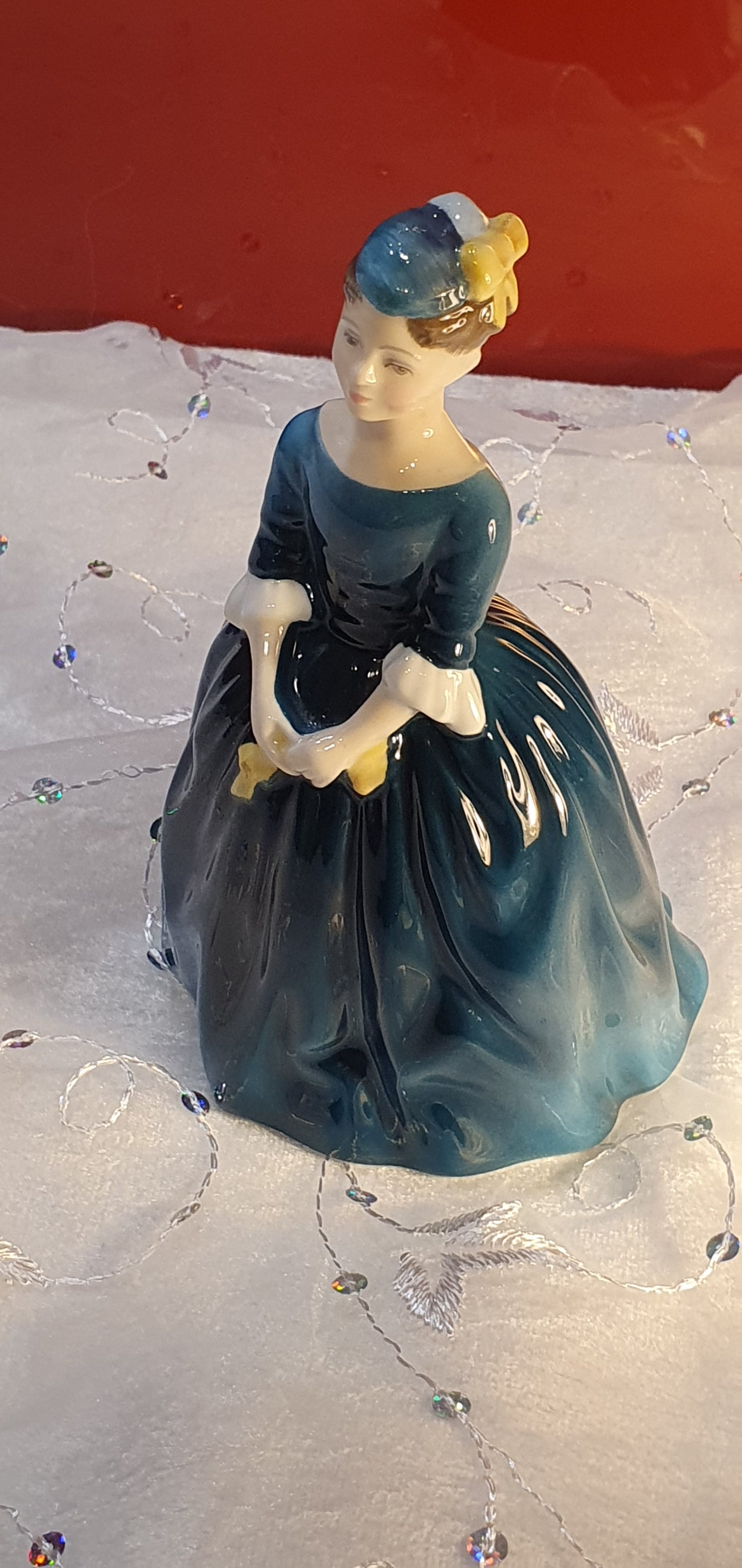 A Royal Doulton figure called 'Cherie'.