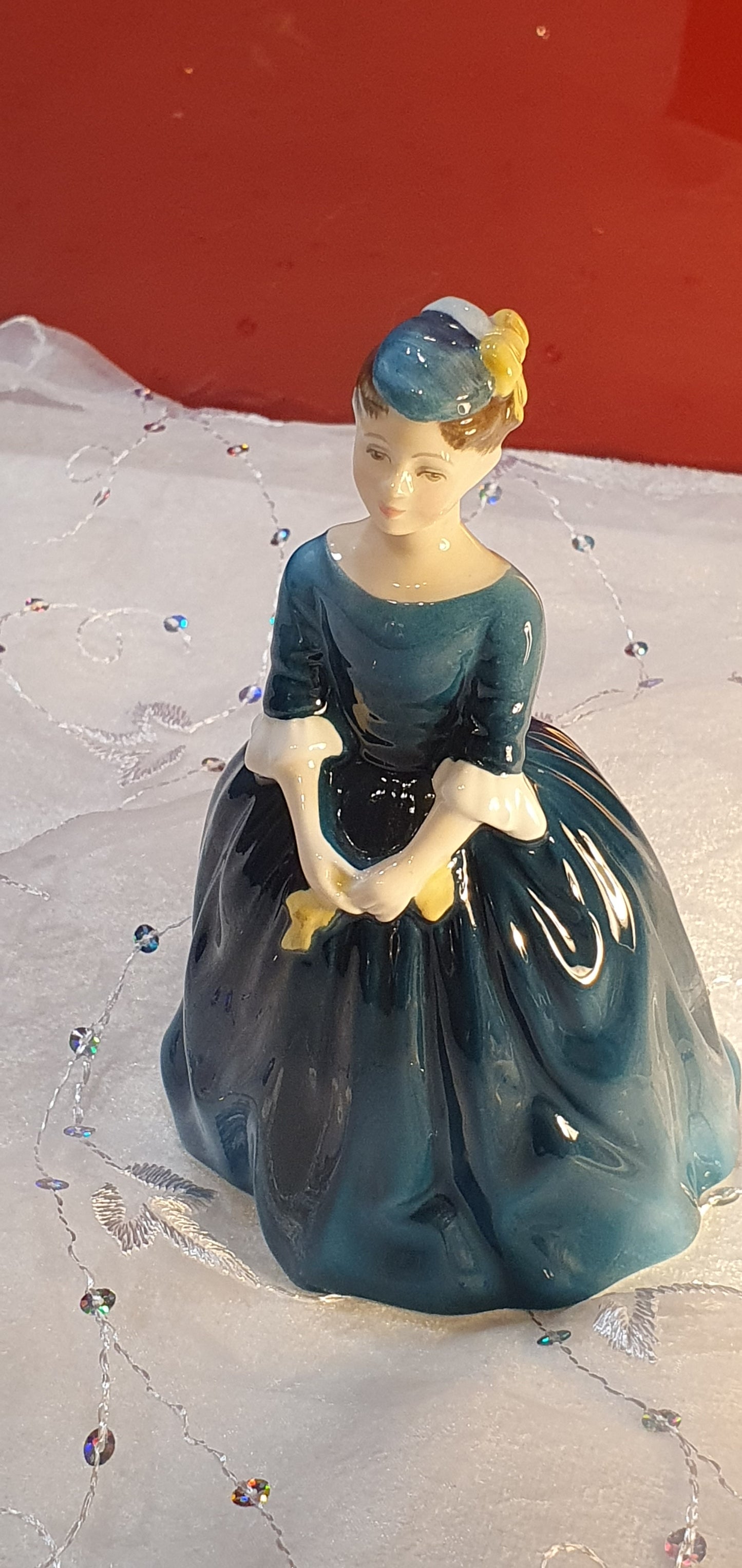A Royal Doulton figure called 'Cherie'.