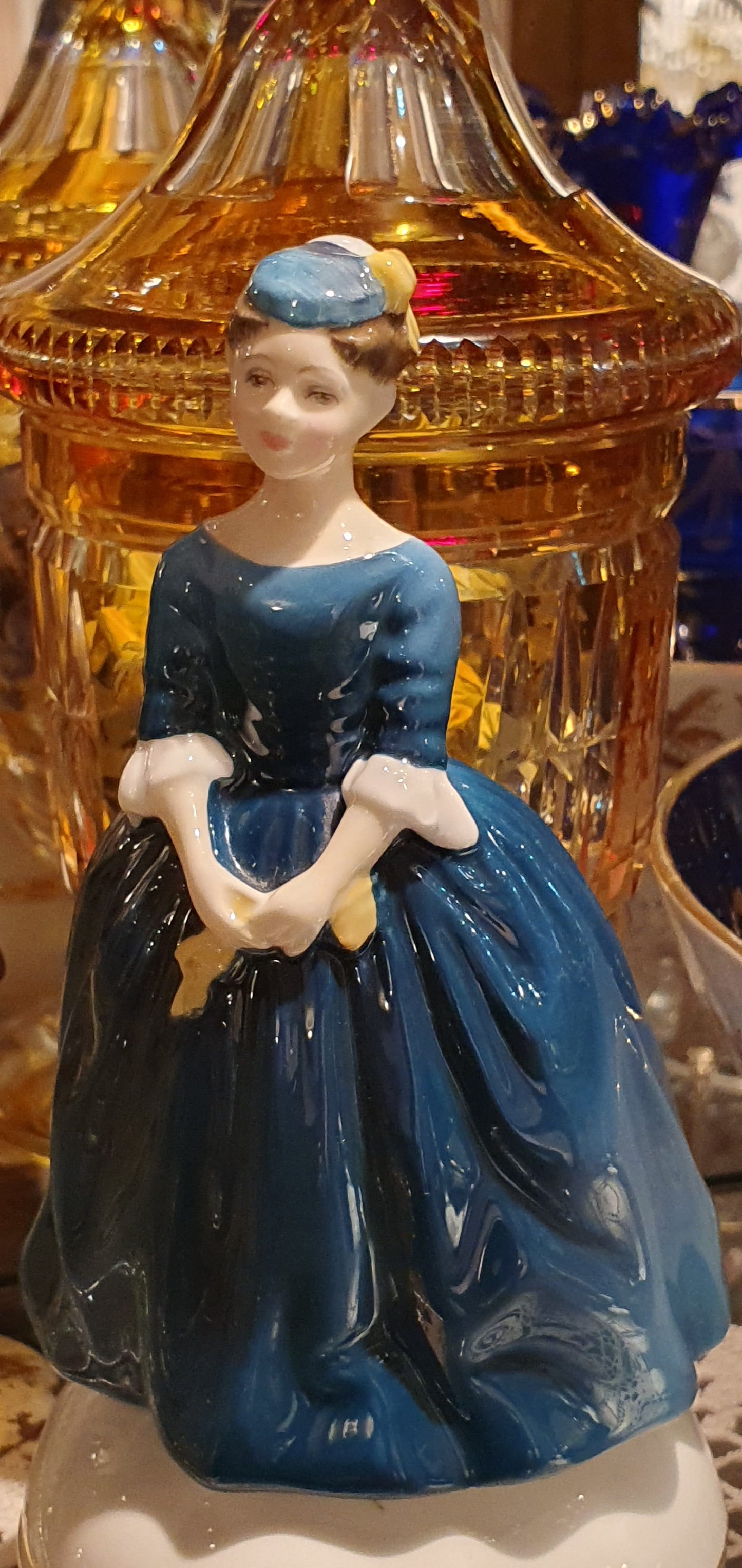 A Royal Doulton figure called 'Cherie'.