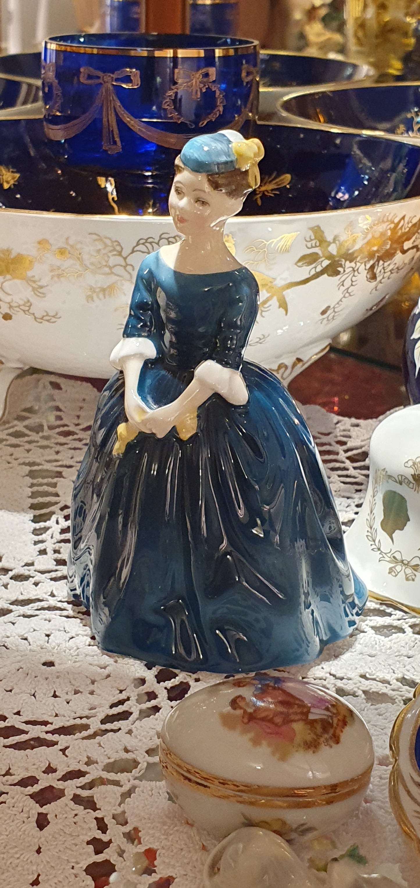 A Royal Doulton figure called 'Cherie'.