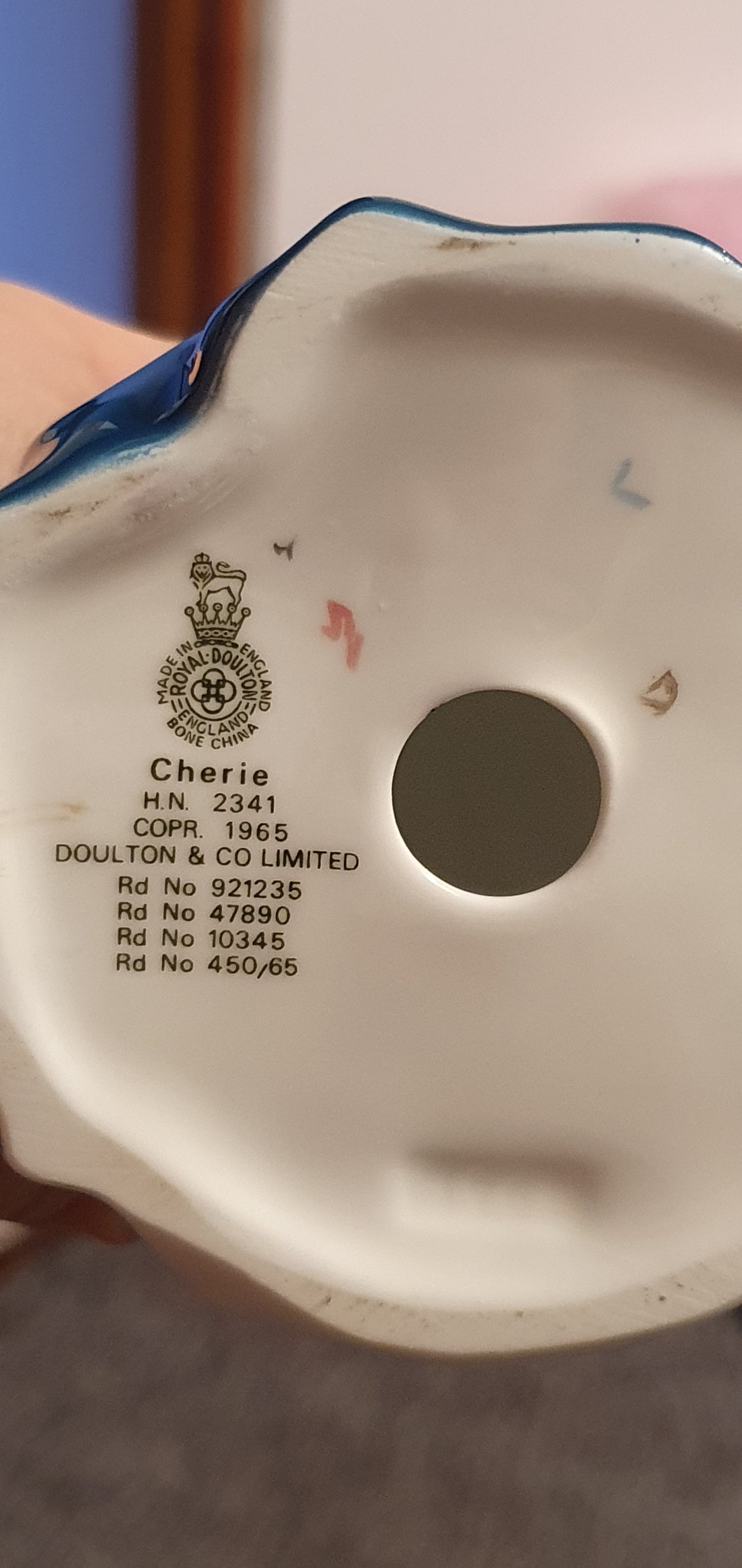 A Royal Doulton figure called 'Cherie'.