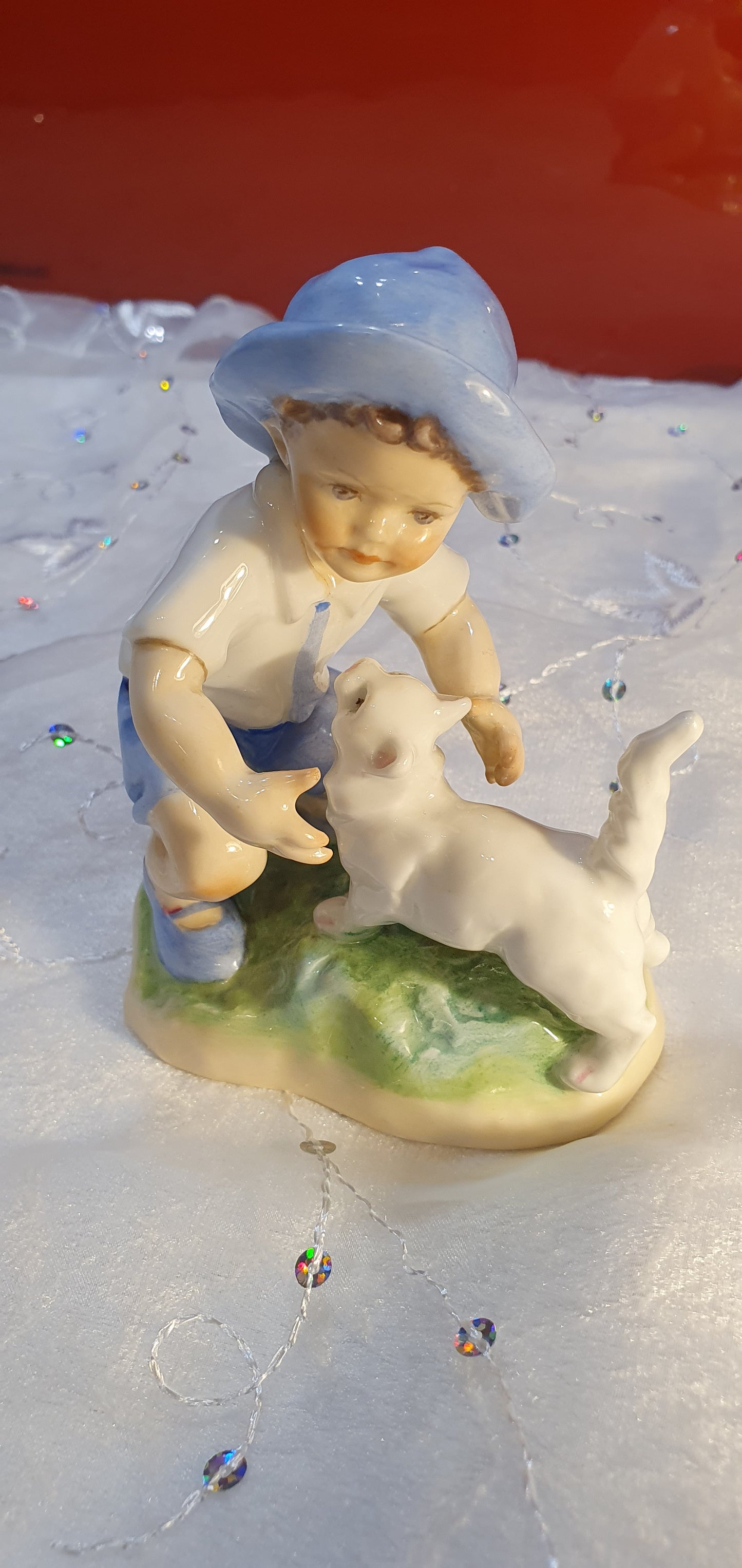 Porcelain Figure by Freda G. Doughty for Royal Worcester.
