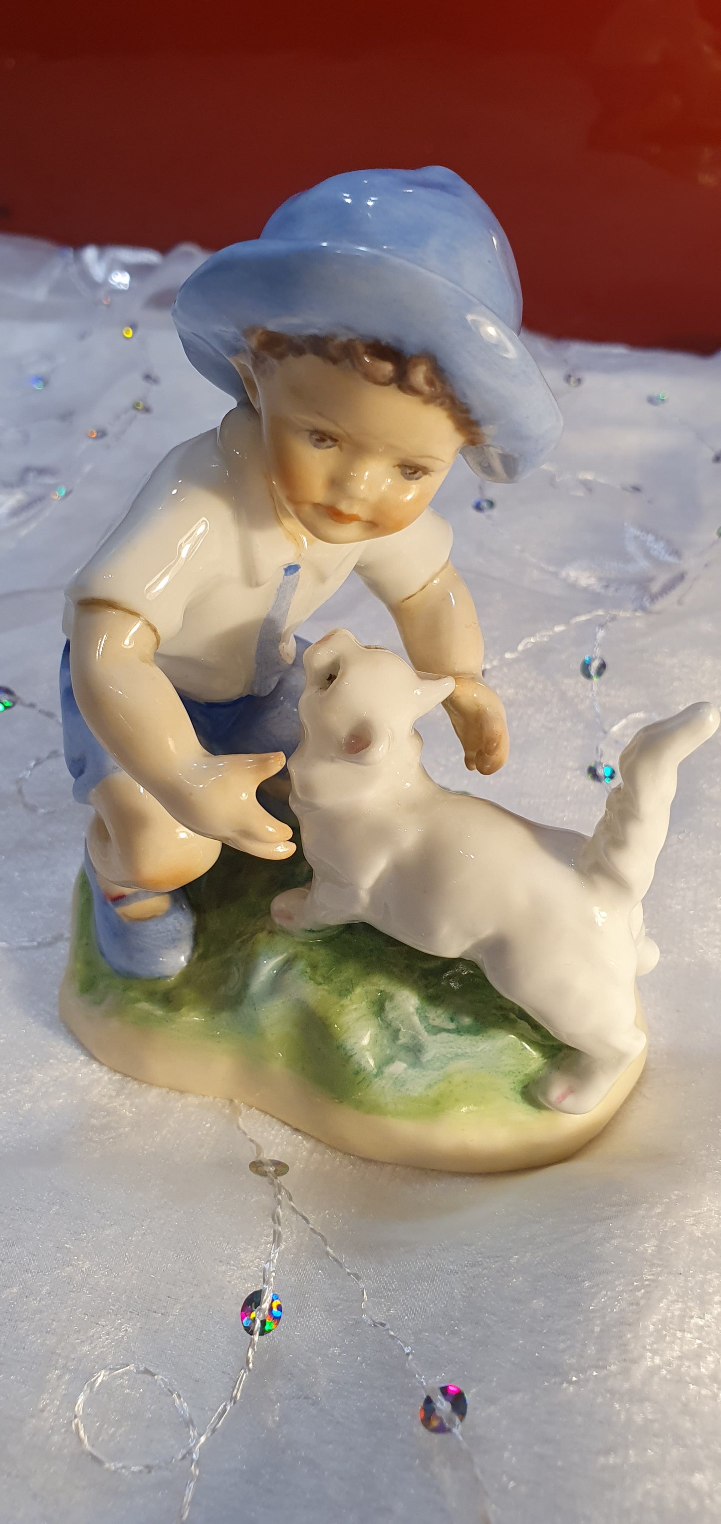 Porcelain Figure by Freda G. Doughty for Royal Worcester.