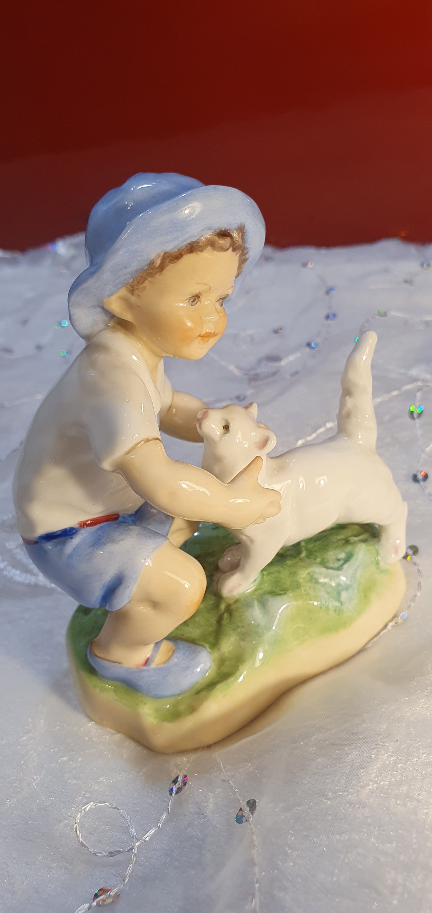 Porcelain Figure by Freda G. Doughty for Royal Worcester.