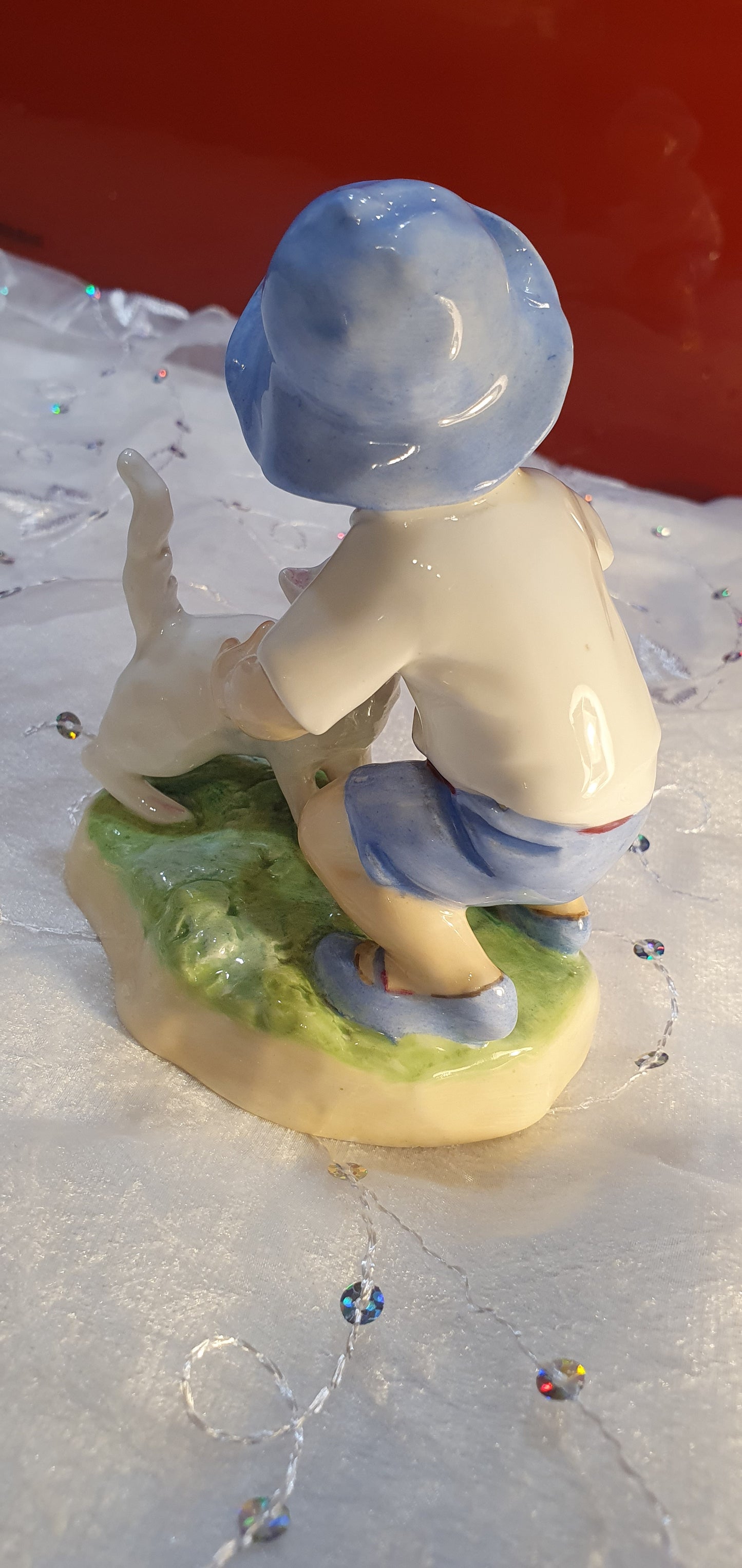 Porcelain Figure by Freda G. Doughty for Royal Worcester.