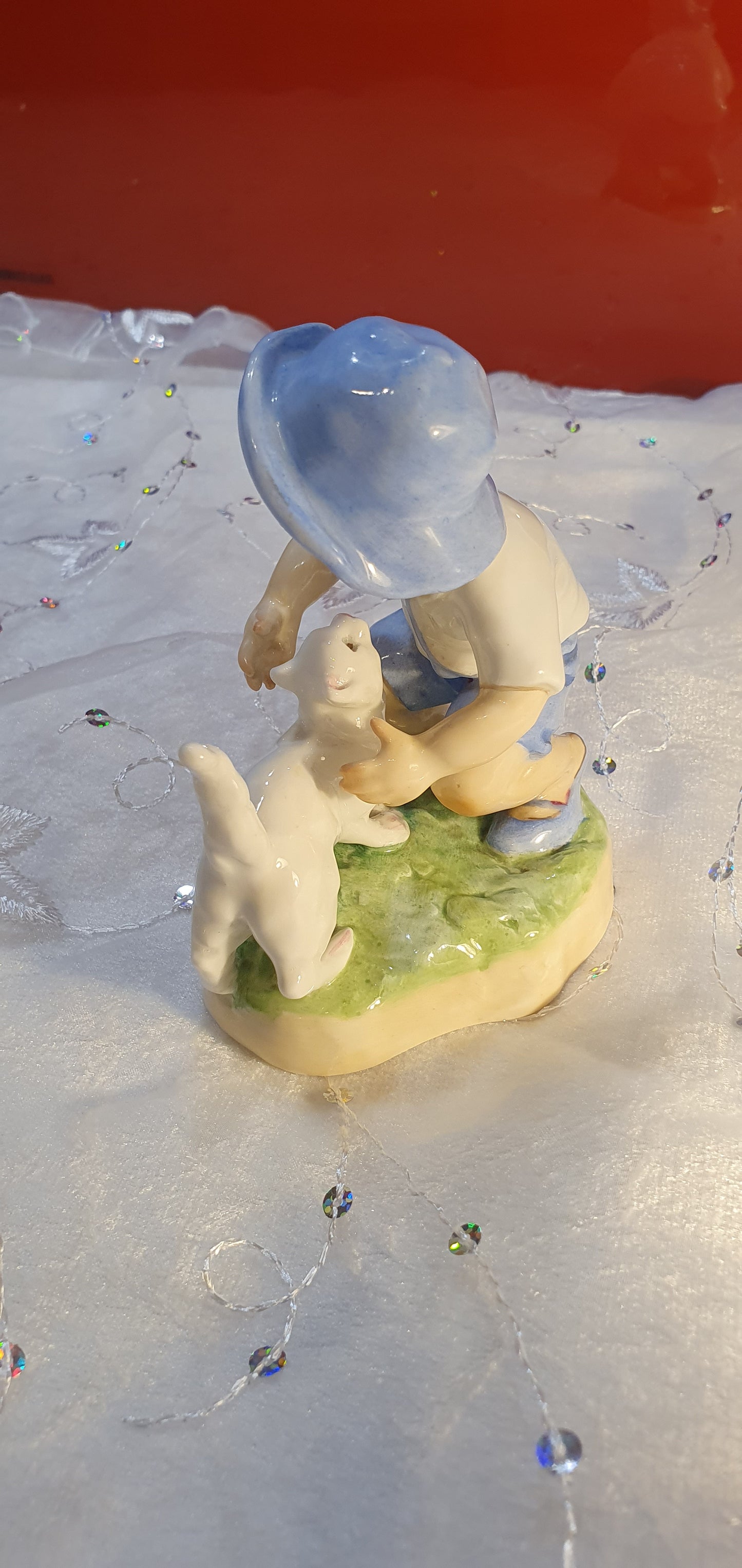 Porcelain Figure by Freda G. Doughty for Royal Worcester.