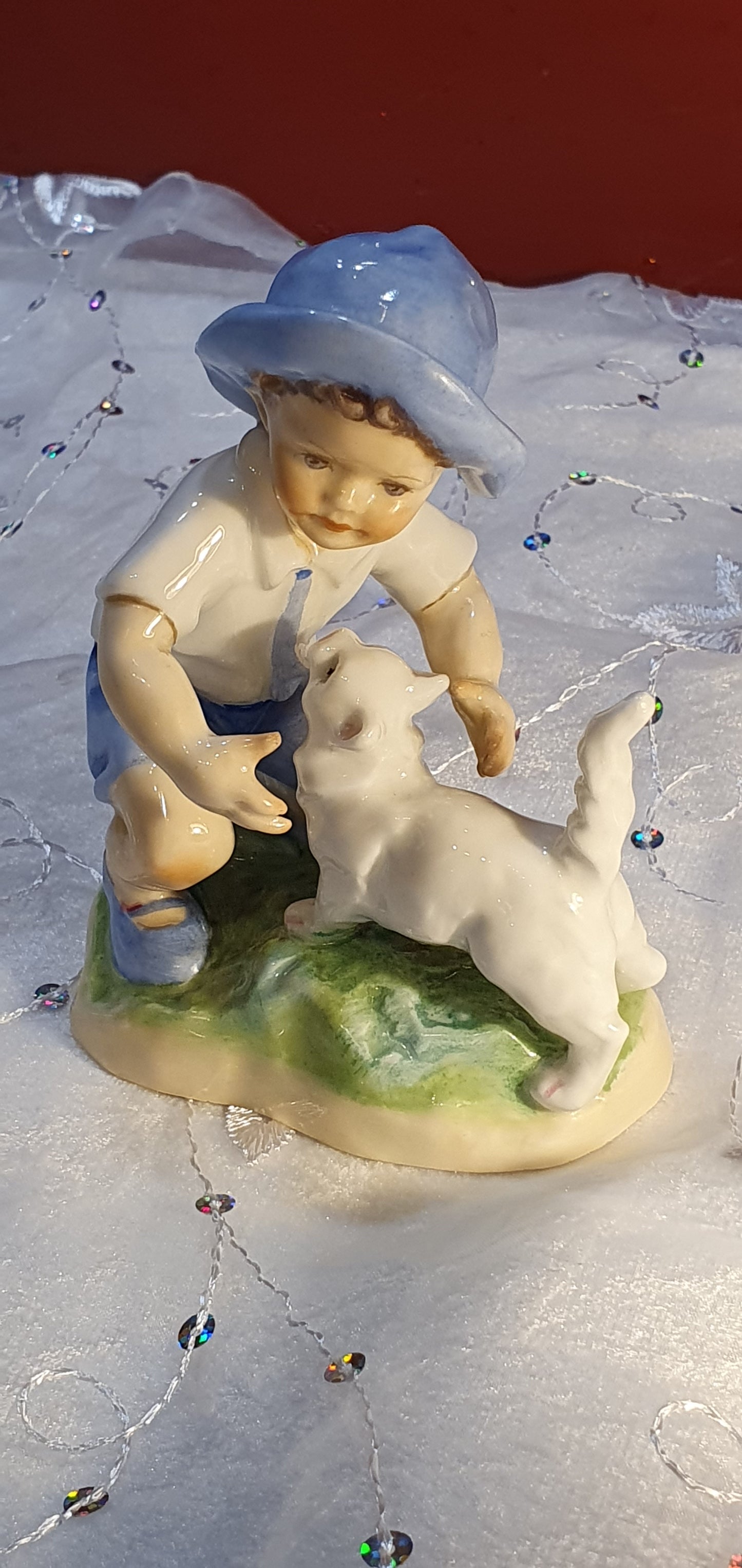 Porcelain Figure by Freda G. Doughty for Royal Worcester.