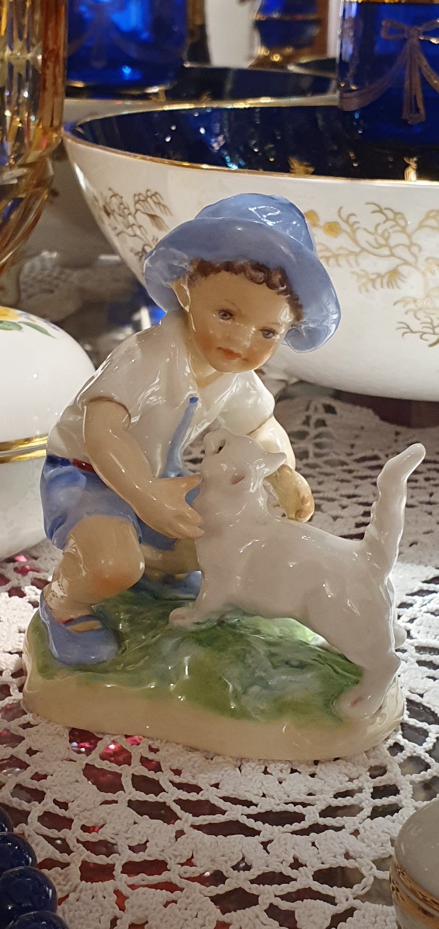 Porcelain Figure by Freda G. Doughty for Royal Worcester.