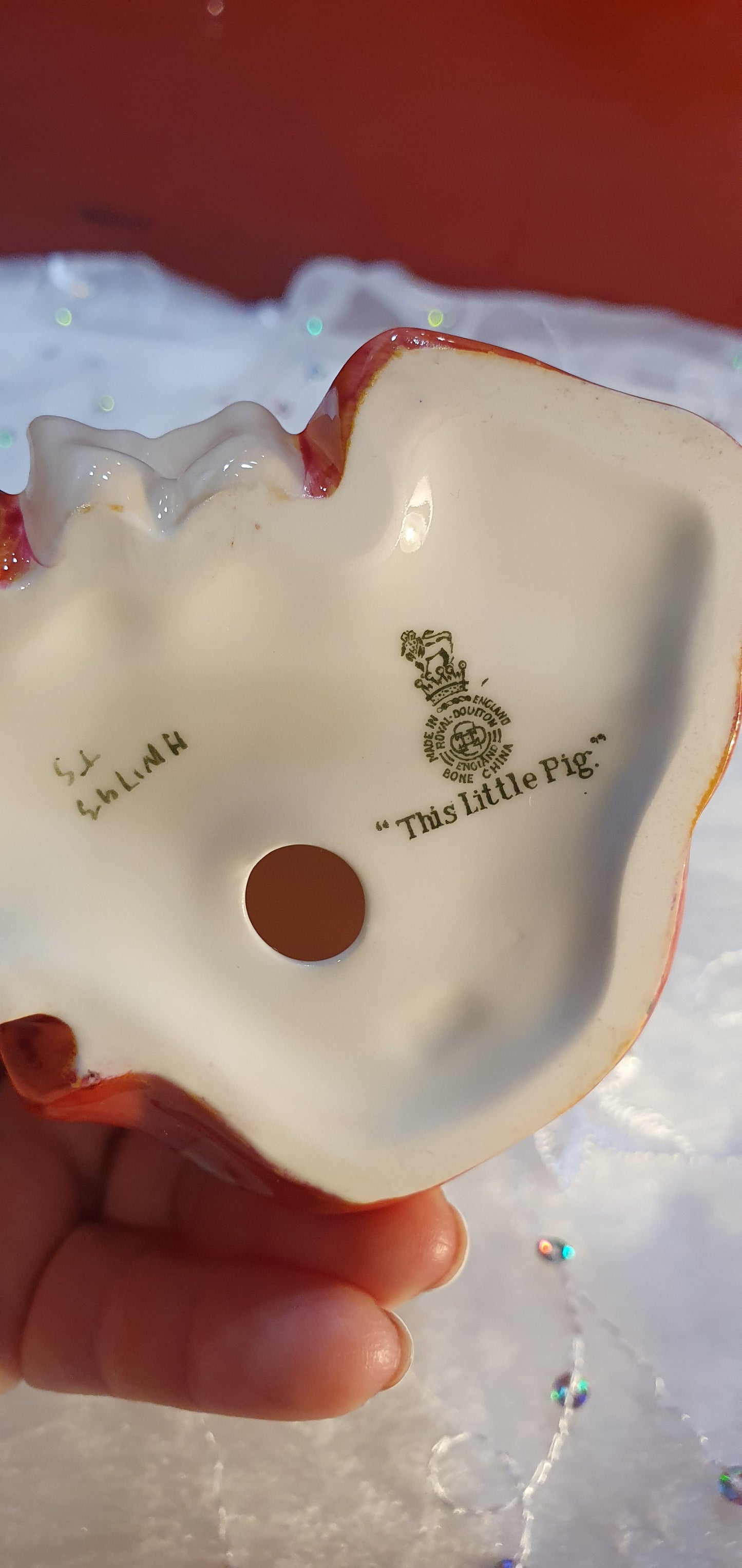 A Royal Doulton figurine called This Little Pig