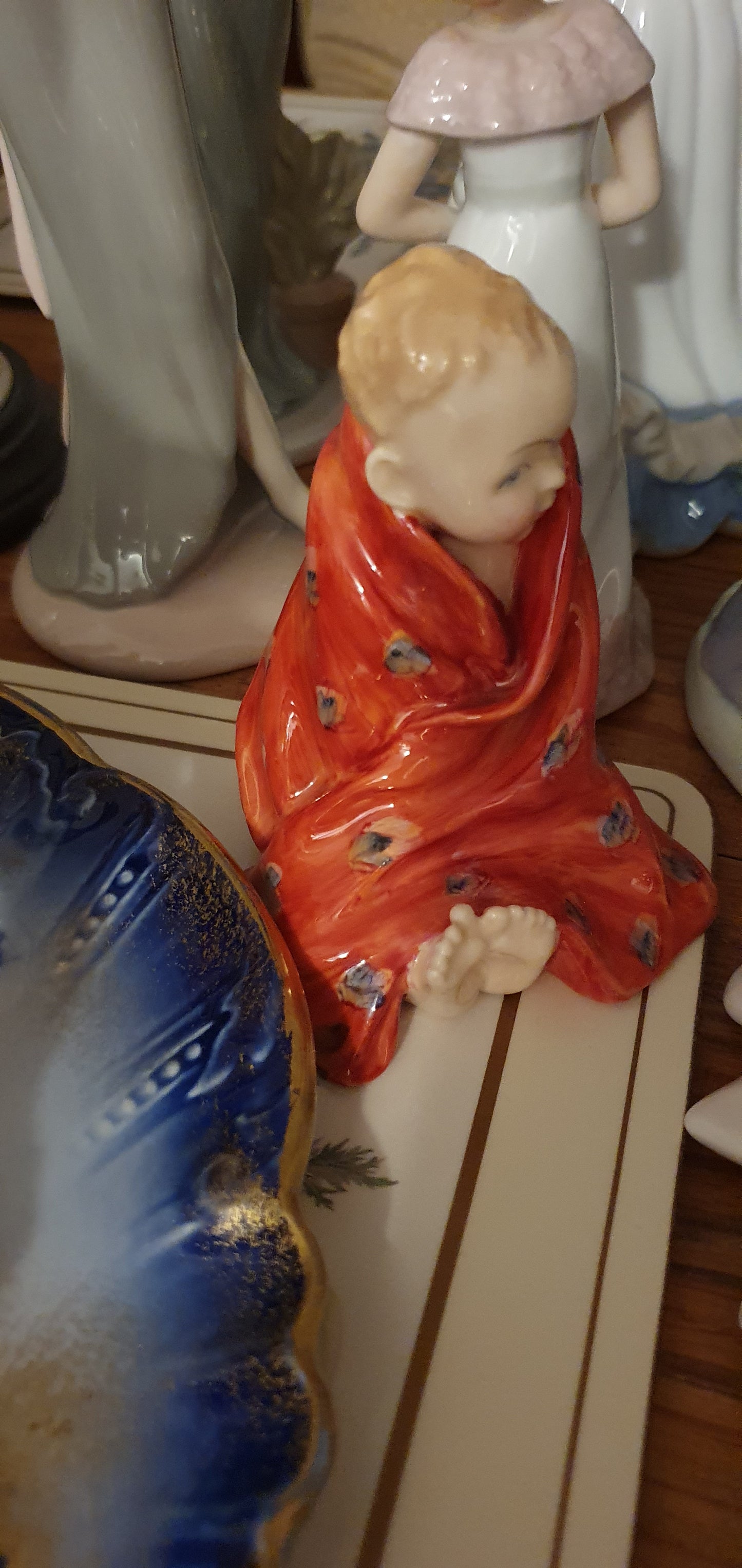 A Royal Doulton figurine called This Little Pig