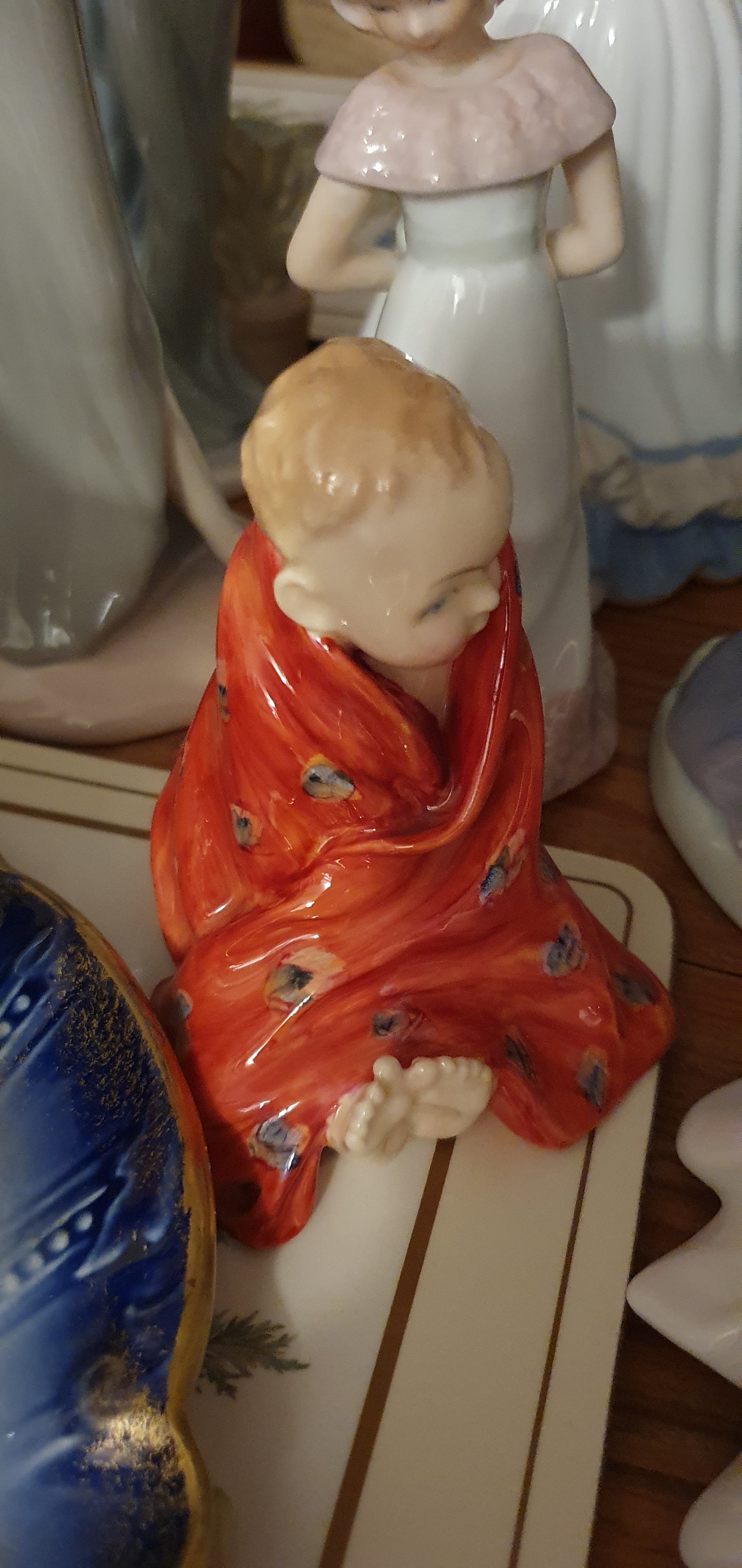 A Royal Doulton figurine called This Little Pig