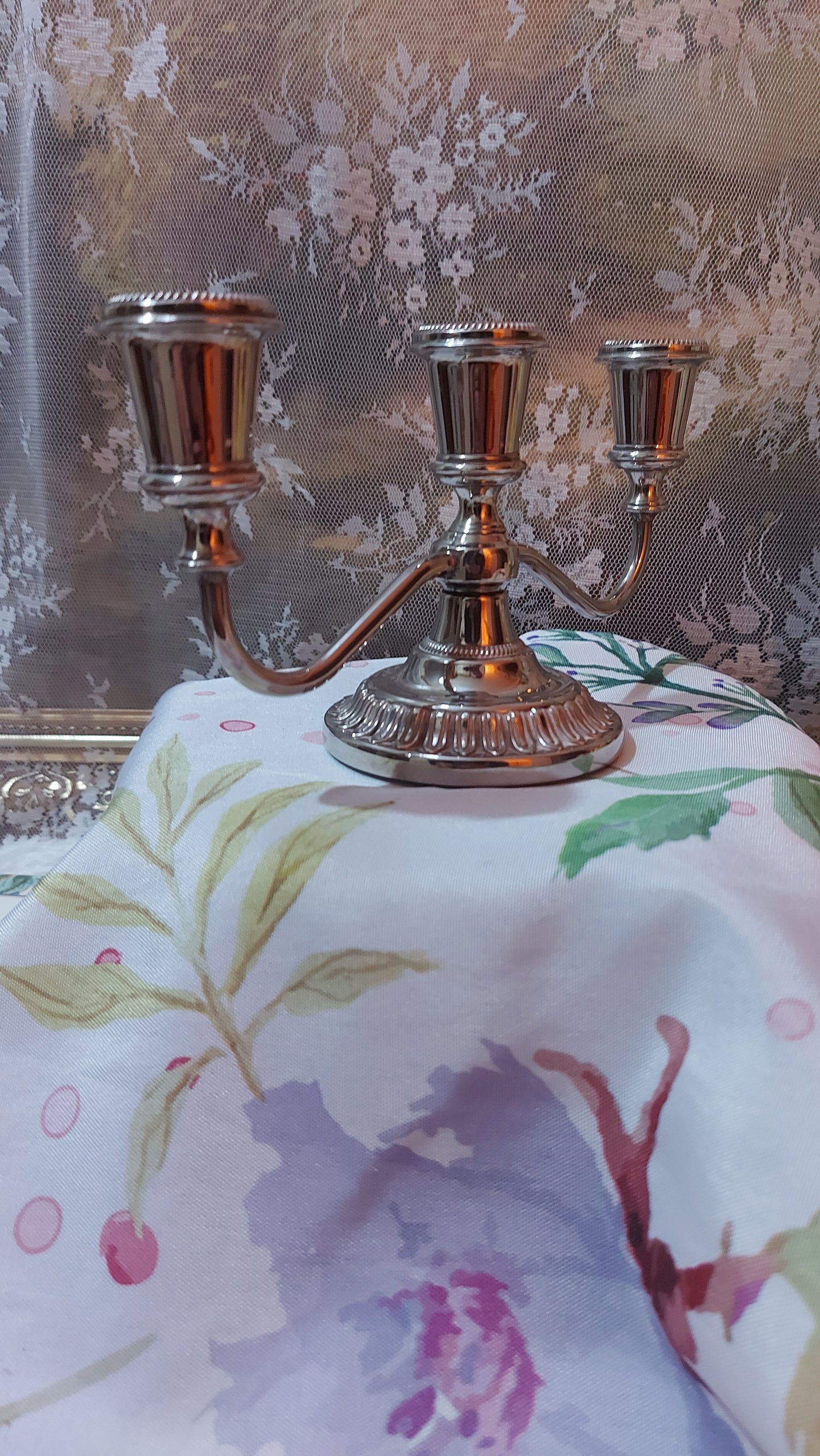 Vintage silver-plated candlestick with three arms
