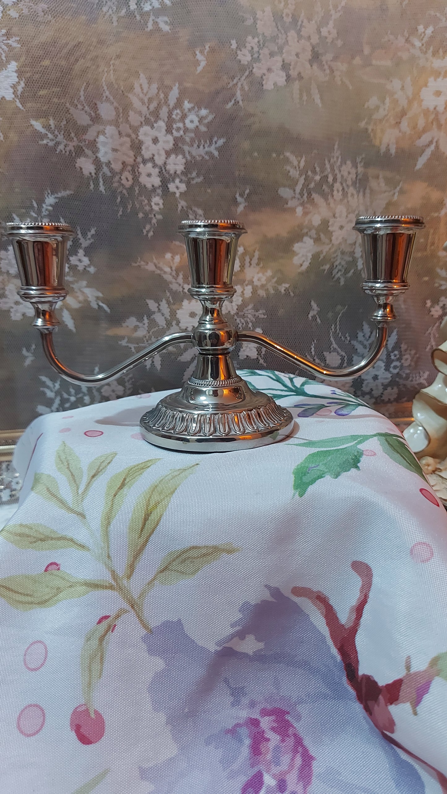 Vintage silver-plated candlestick with three arms
