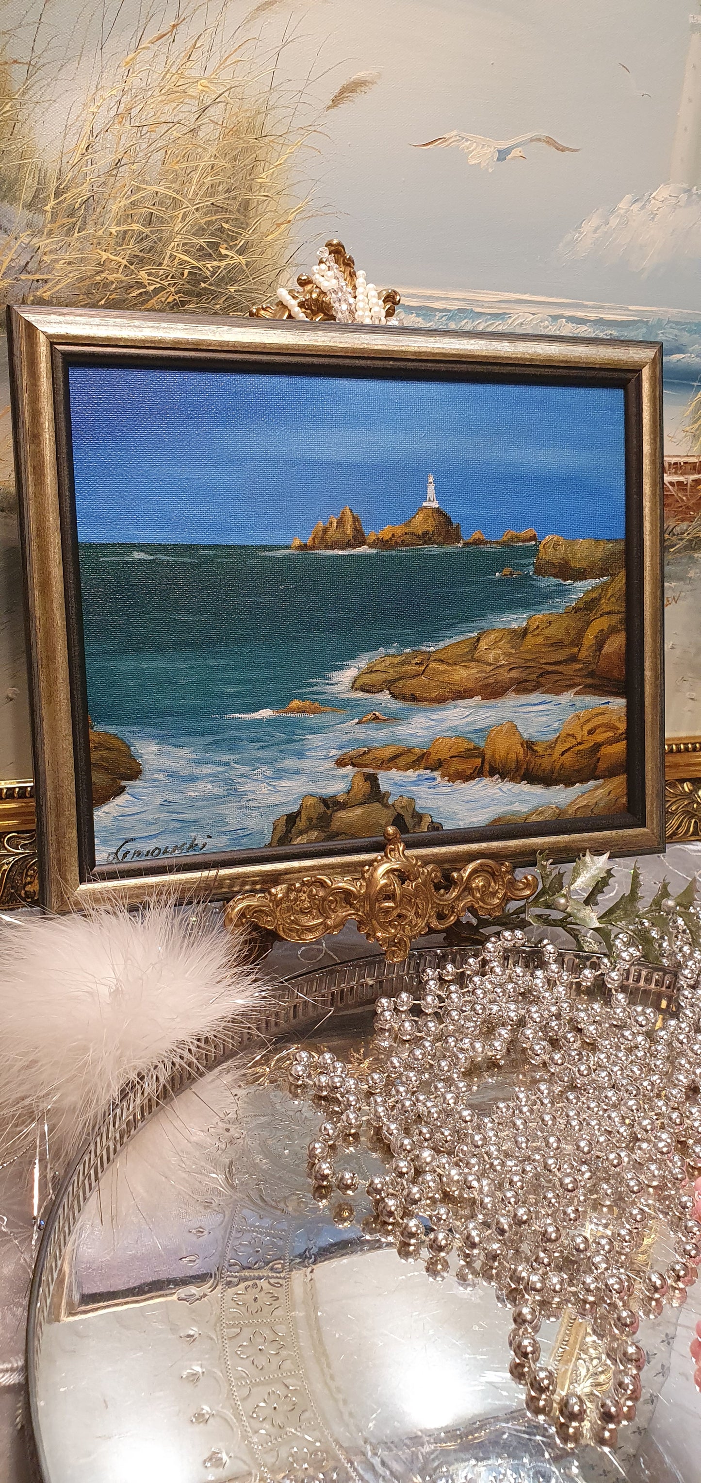 A painting depicting a seascape