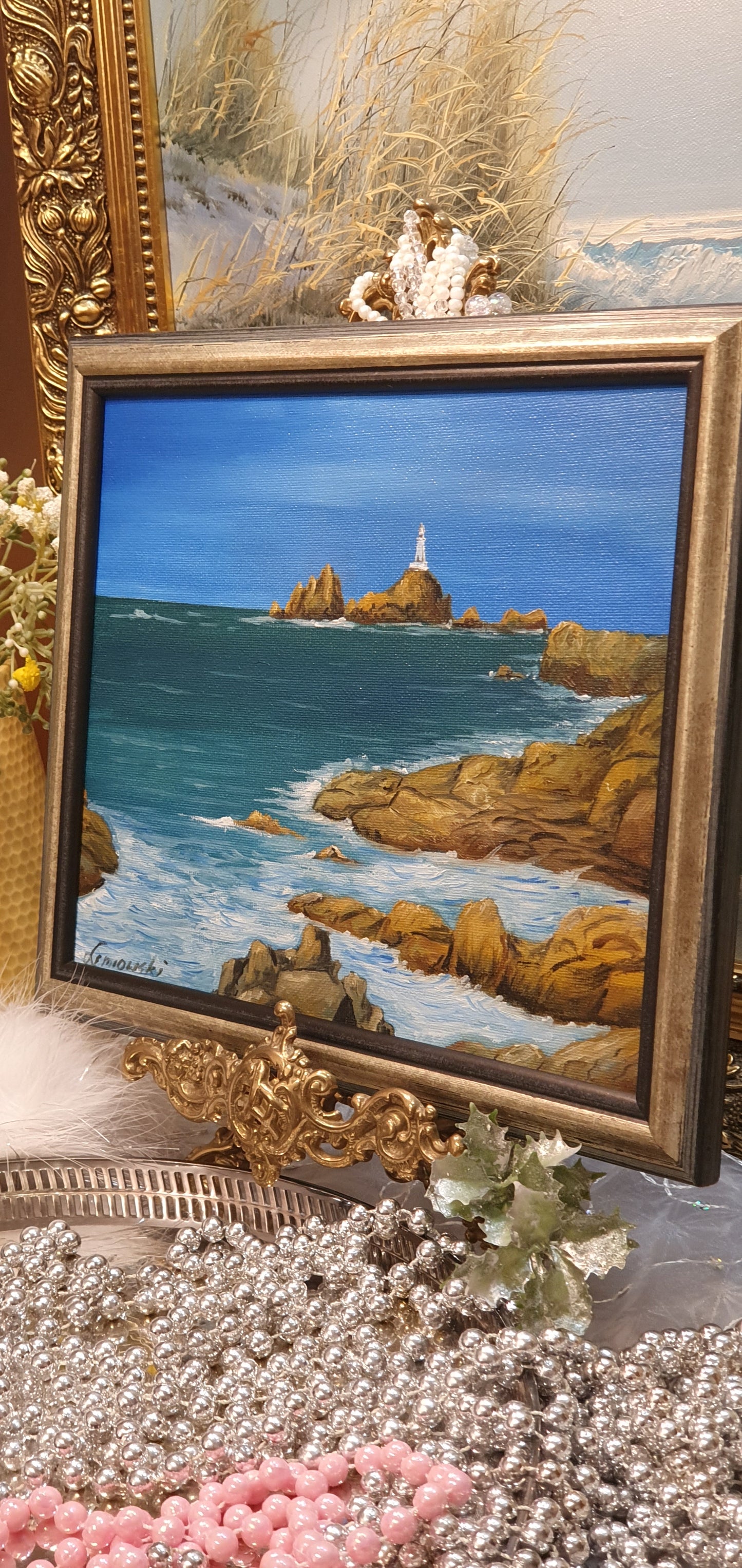 A painting depicting a seascape