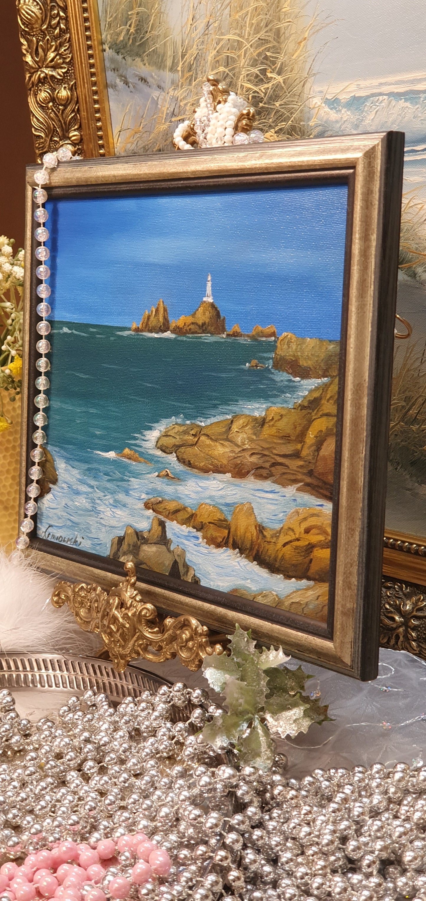 A painting depicting a seascape