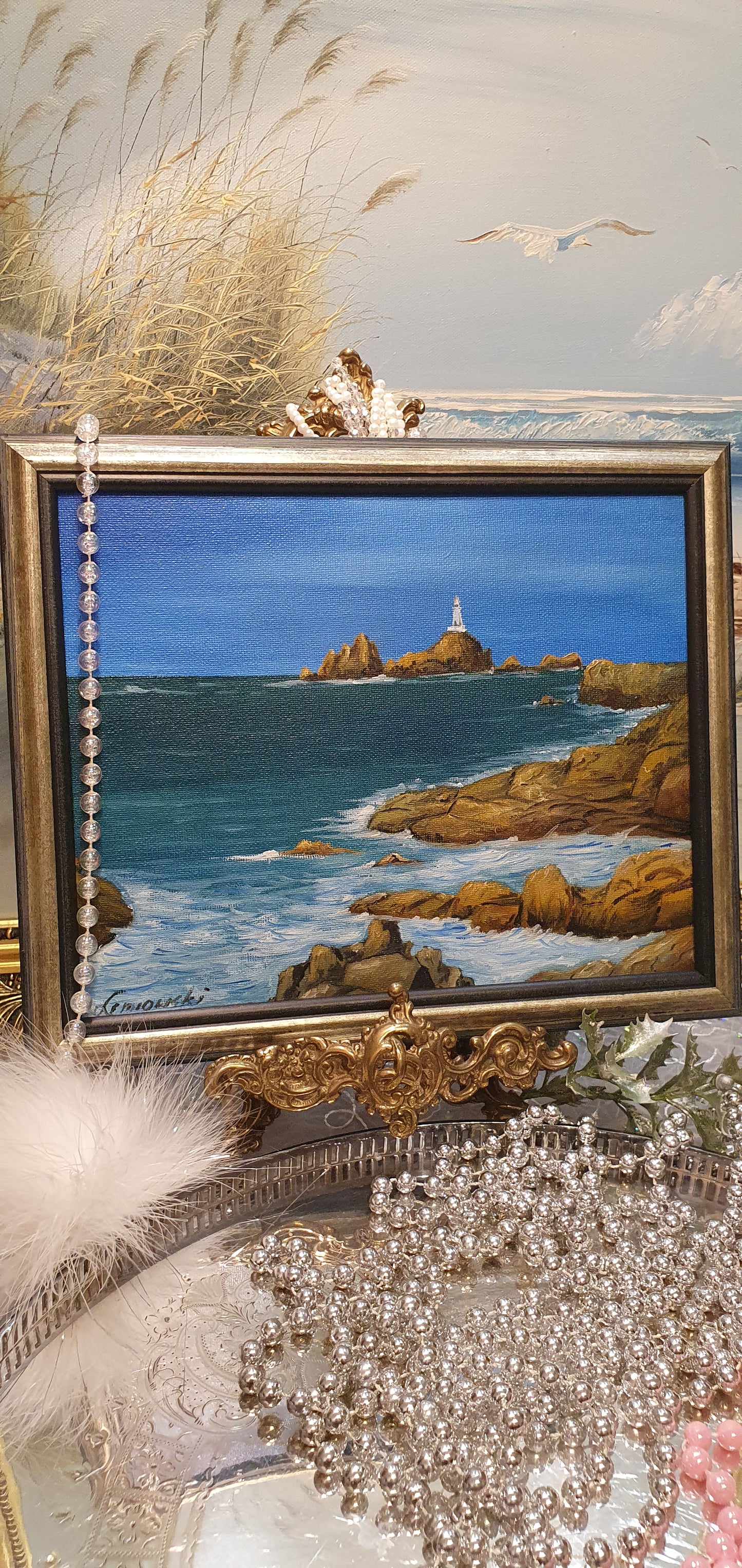 A painting depicting a seascape